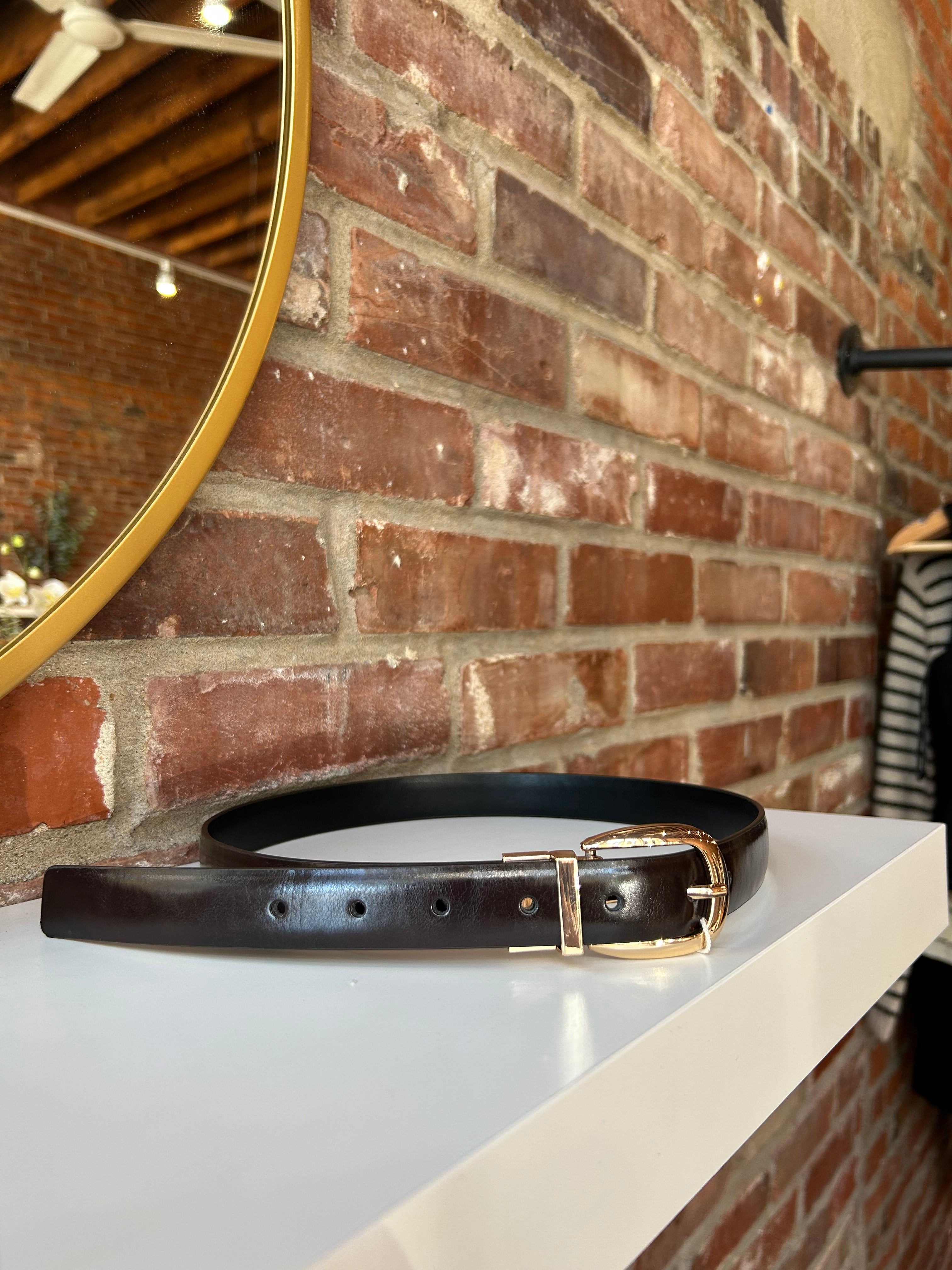 Reversible brown and black belt with gold hardware.