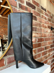 Black leather fold over knee boot with pointed toed and 3 1/4 inch heel.