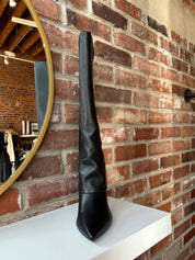 Black leather fold over knee boot with pointed toed and 3 1/4 inch heel.