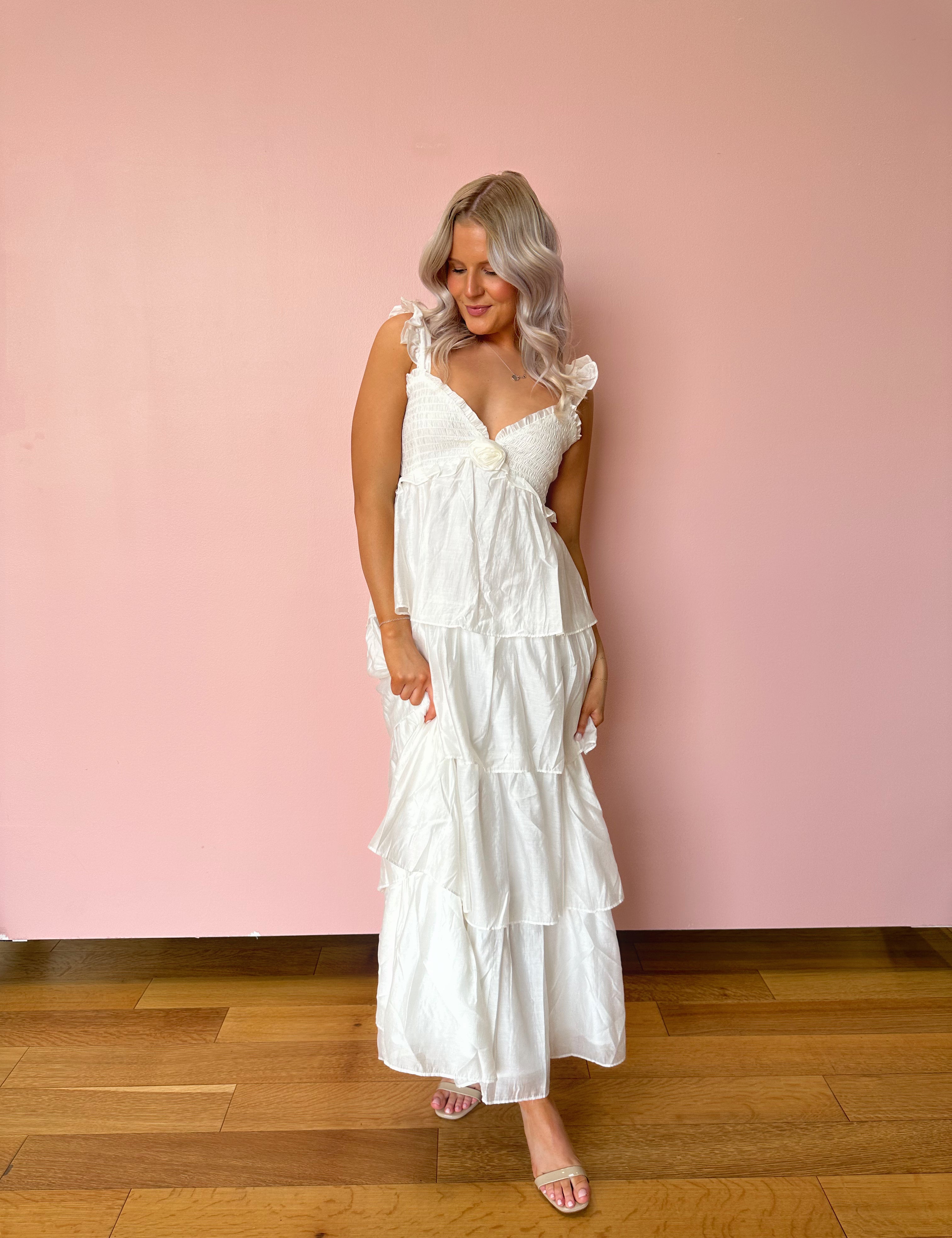 White tiered maxi dress with rosette detail. Great for brides. 