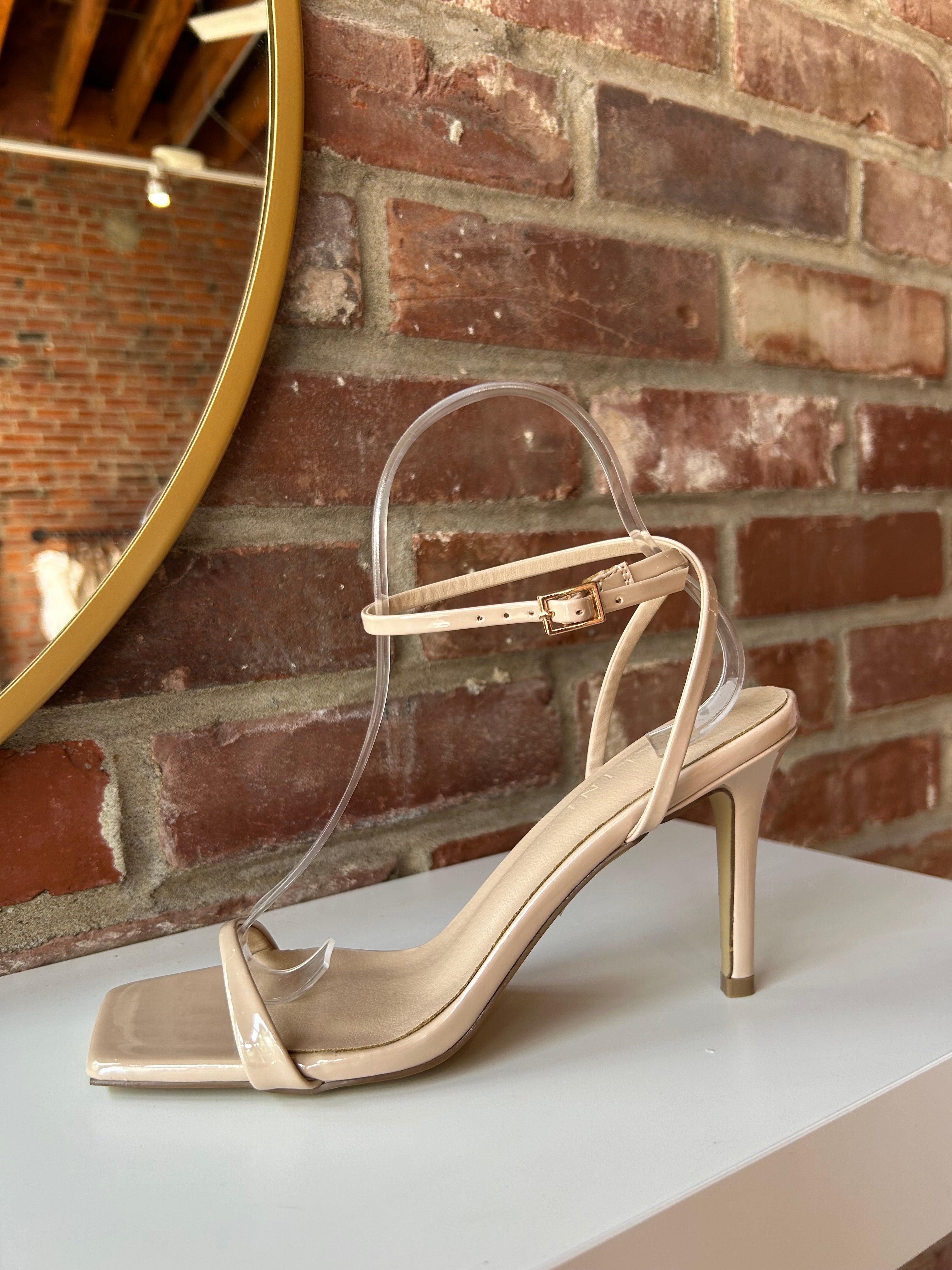 Nude stiletto sandal with square toe and nude ankle strap
