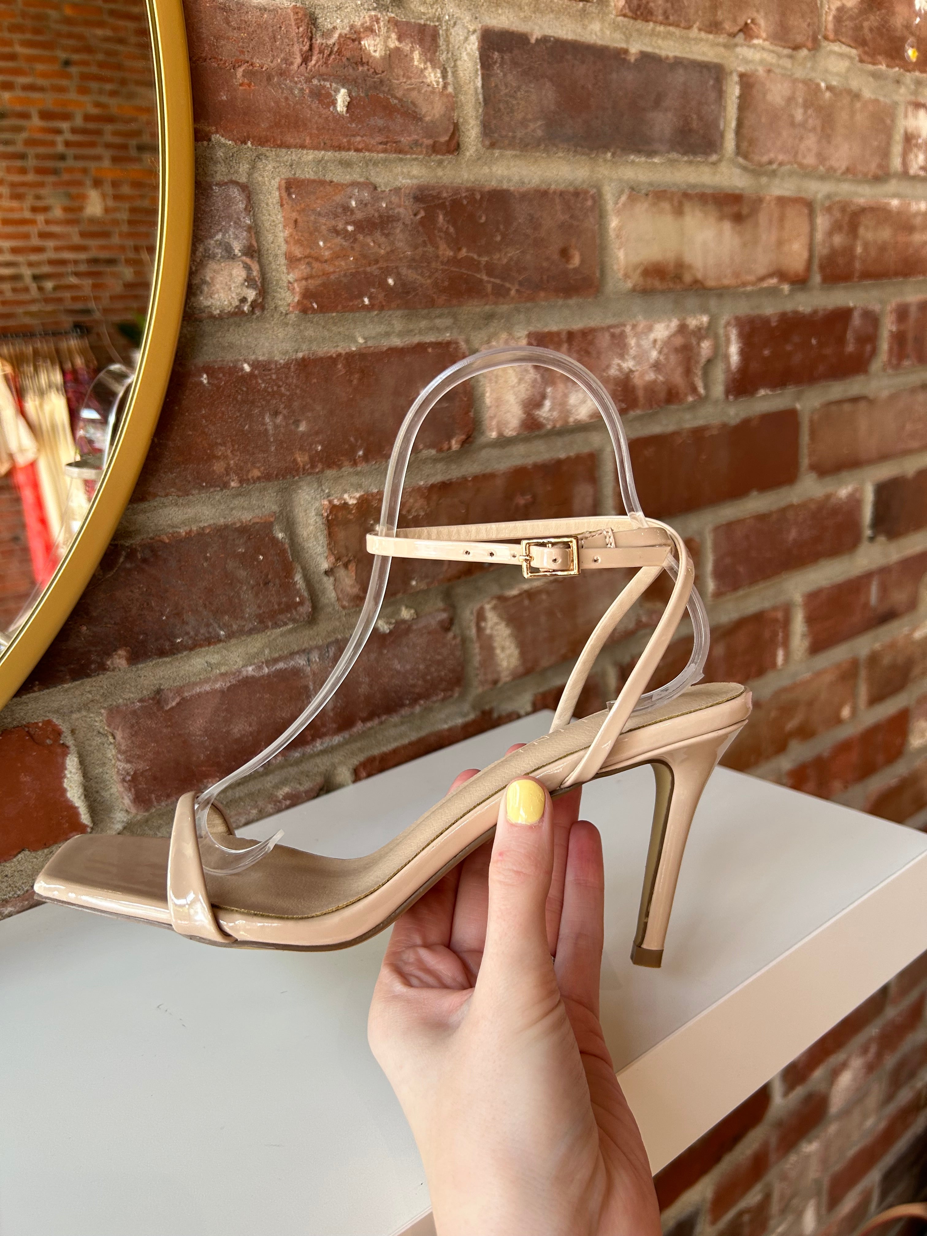 Nude stiletto sandal with square toe and nude ankle strap