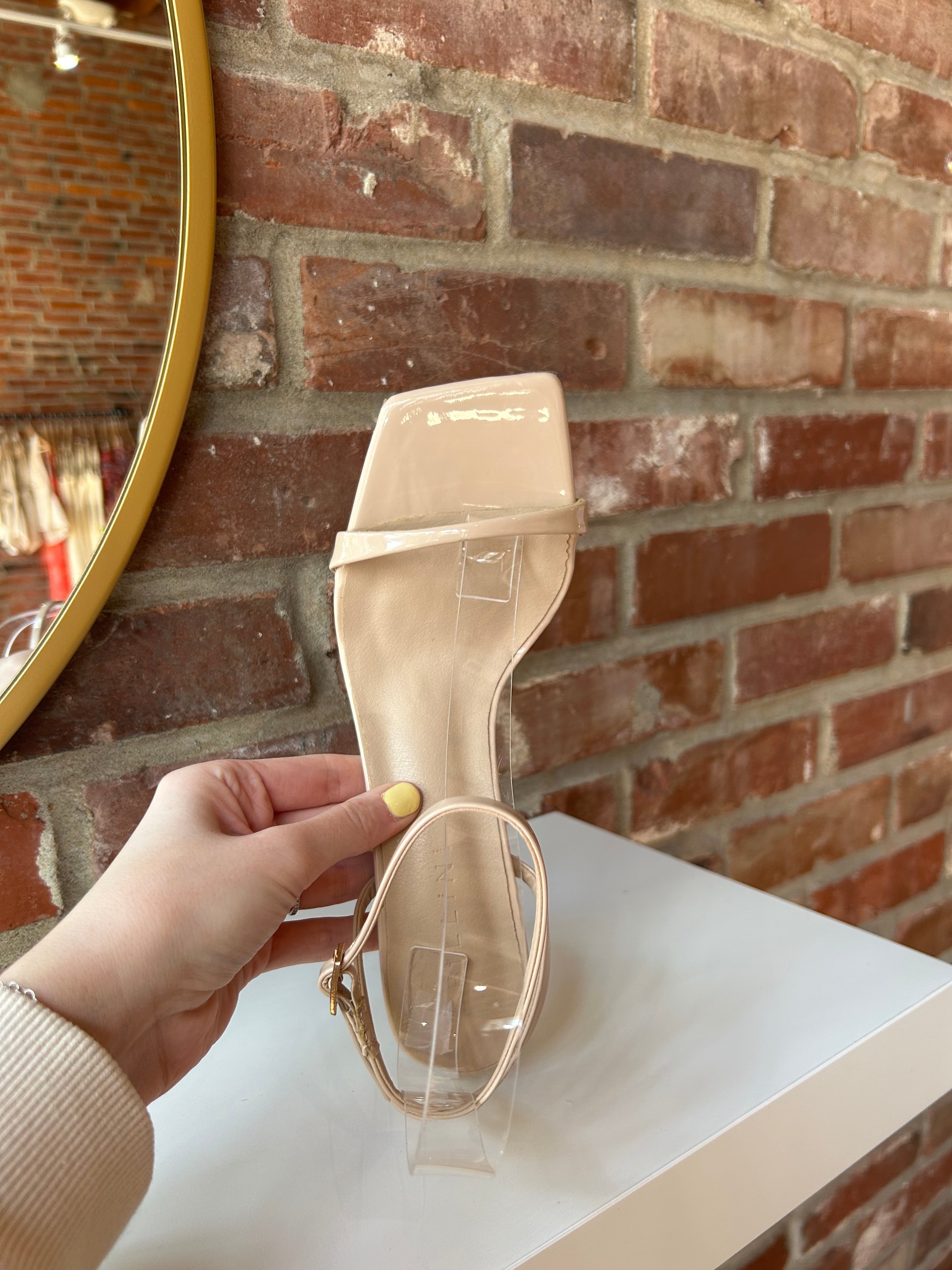 Nude stiletto sandal with square toe and nude ankle strap