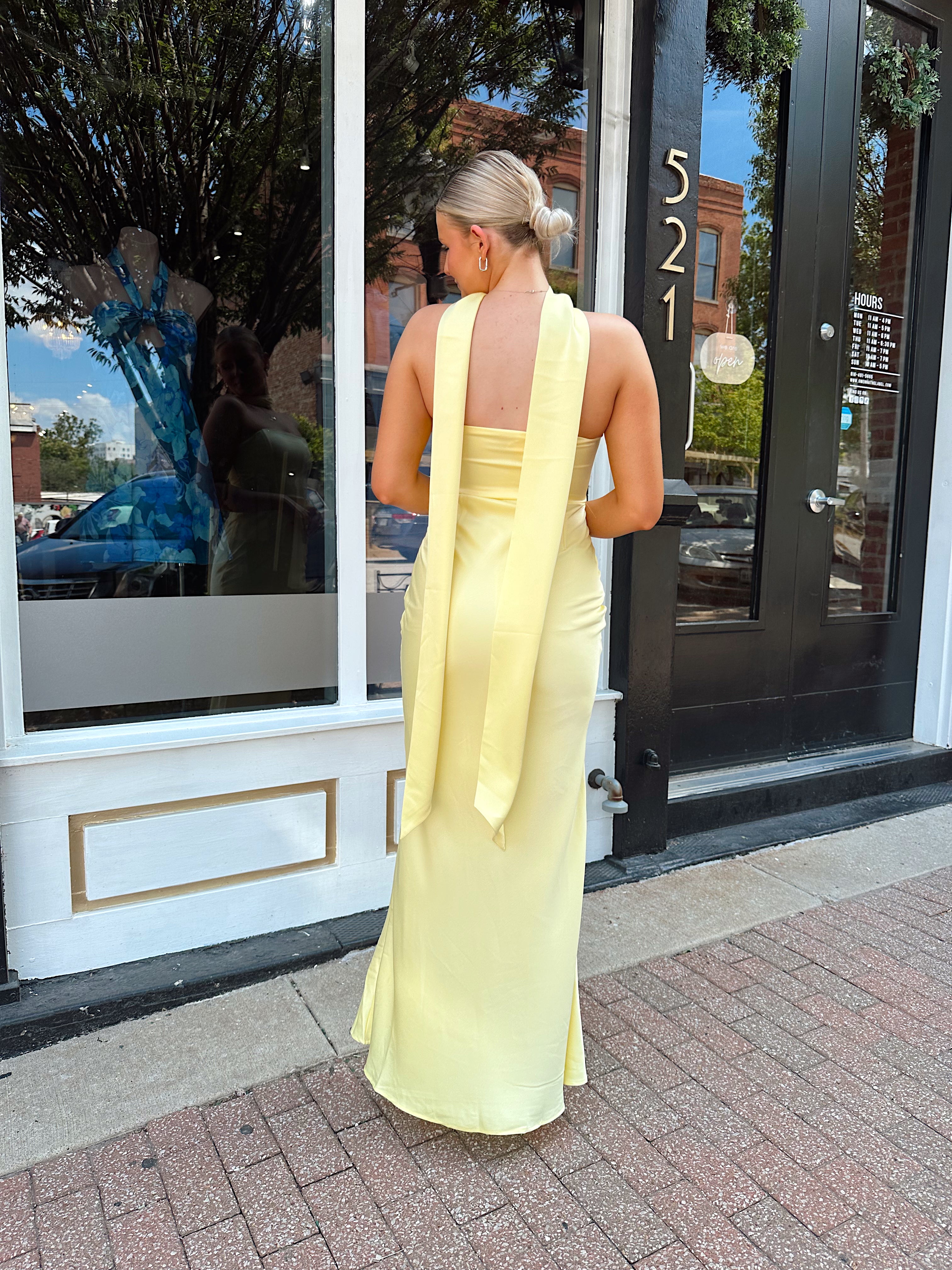 Butter yellow satin strapless maxi dress with detachable scarf.