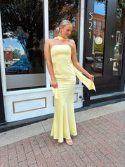 Butter yellow satin strapless maxi dress with detachable scarf.