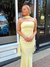 Butter yellow satin strapless maxi dress with detachable scarf.