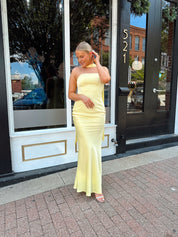 Butter yellow satin strapless maxi dress with detachable scarf.