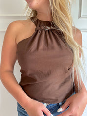 Dark brown tank top with belt buckle neck detail.