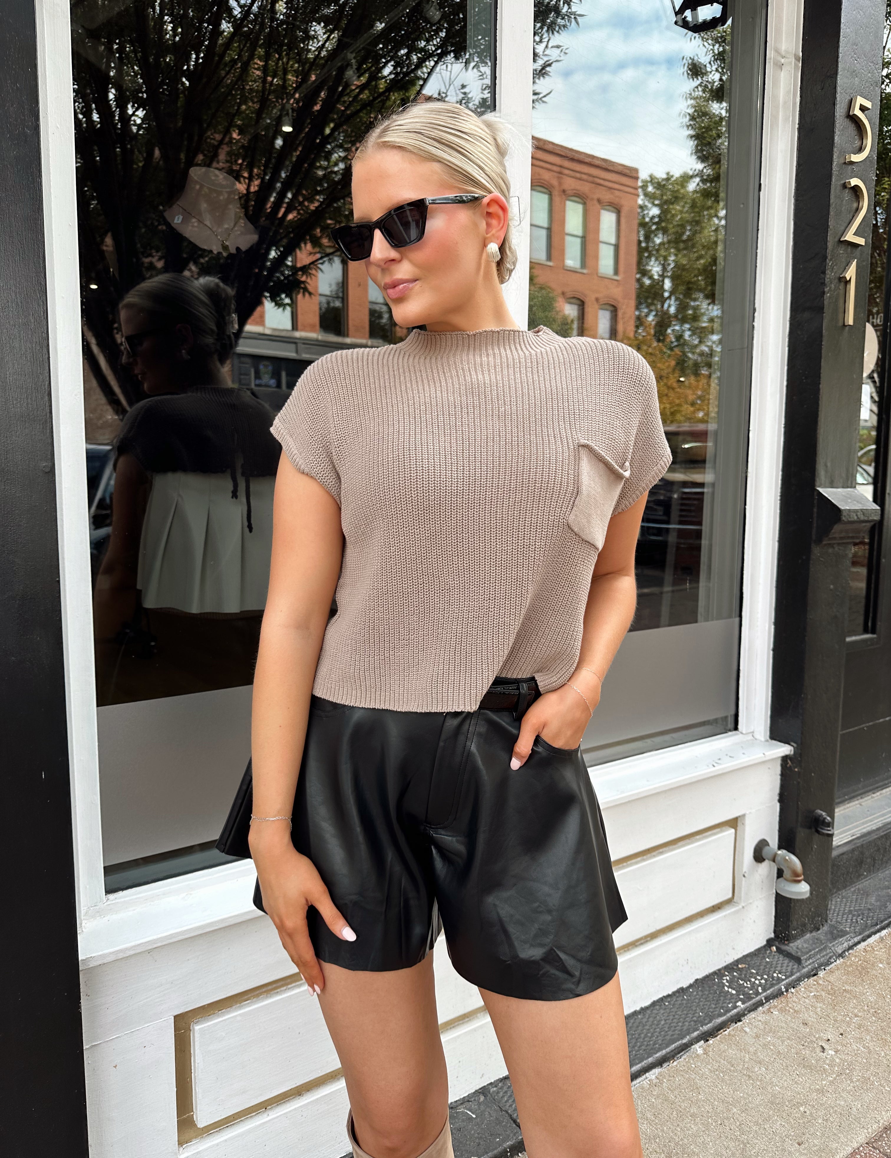 Taupe knit cropped short sleeve sweater with front pocket detail