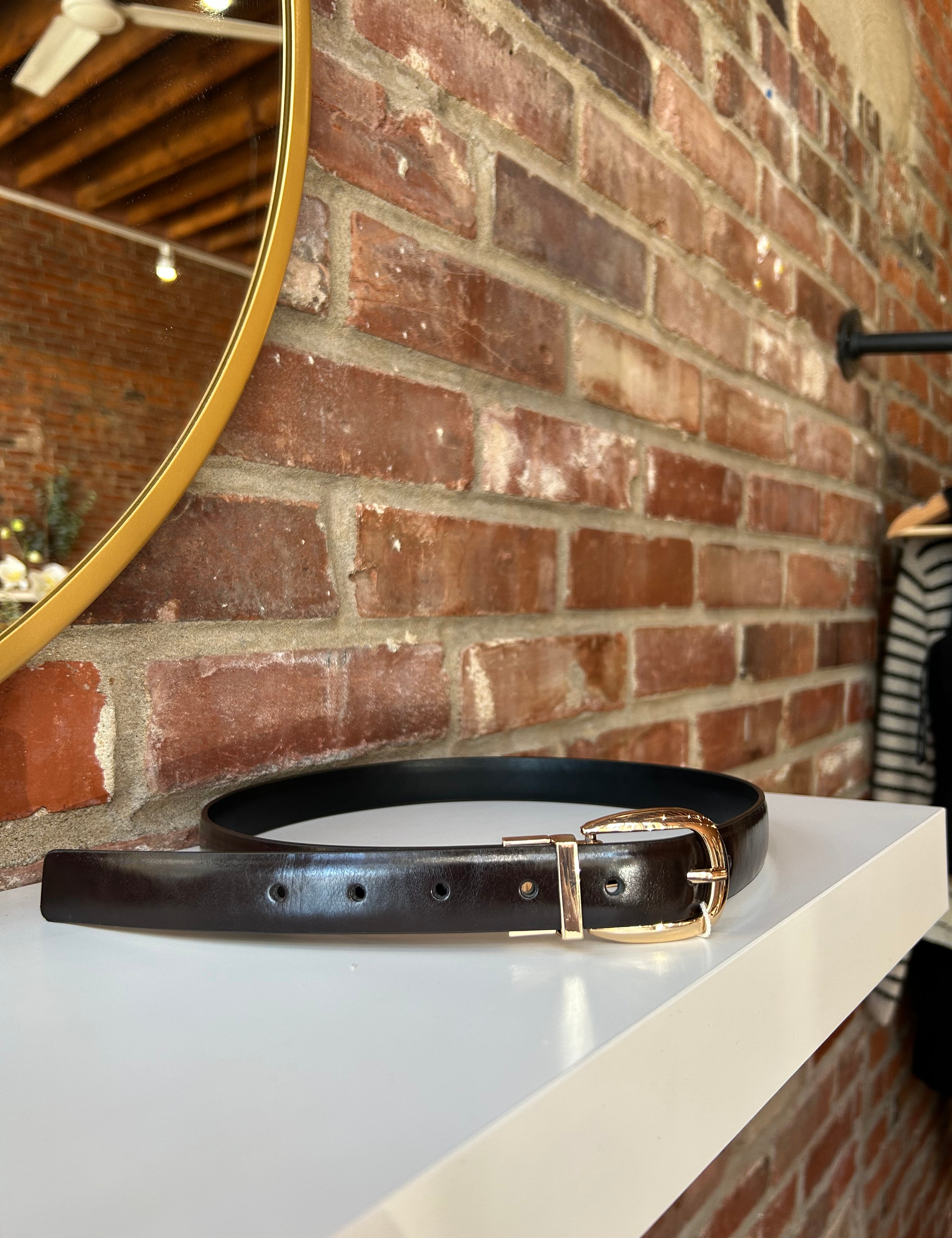 Reversible brown and black belt with gold hardware. 