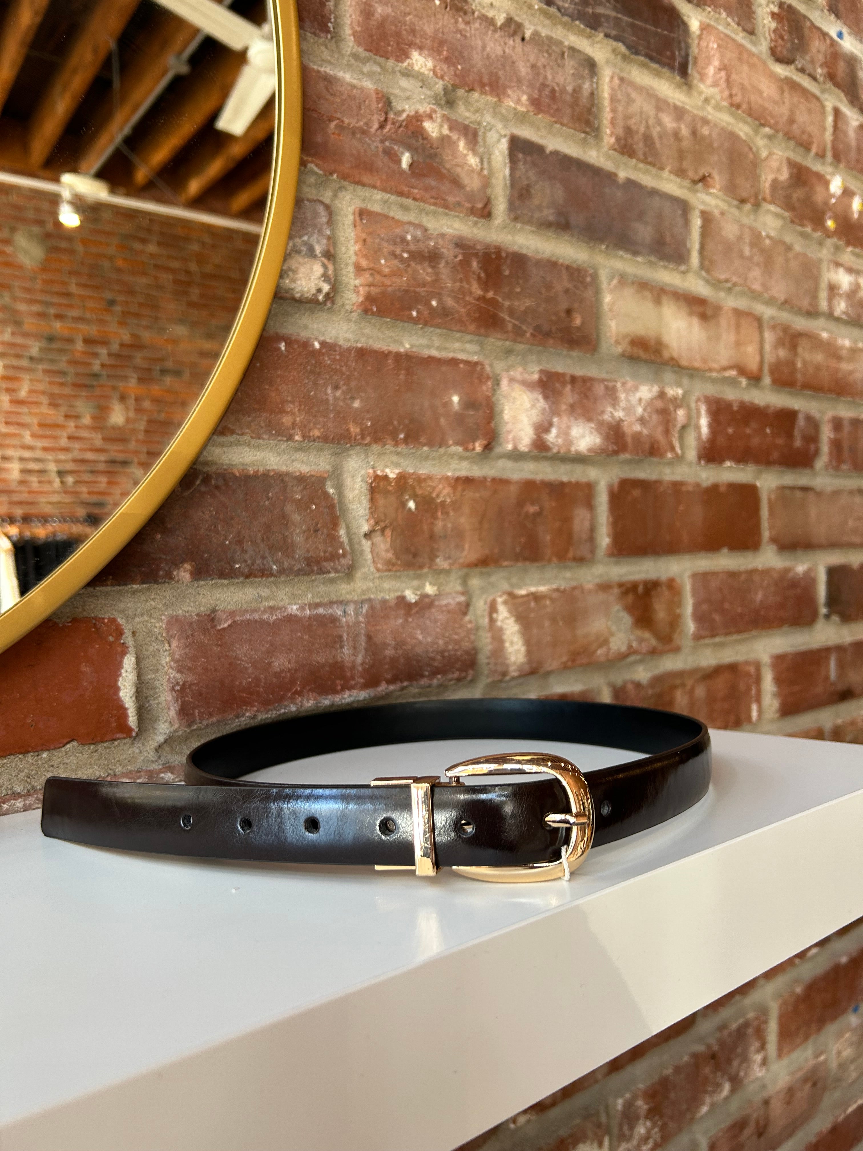 Reversible brown and black belt with gold hardware. 