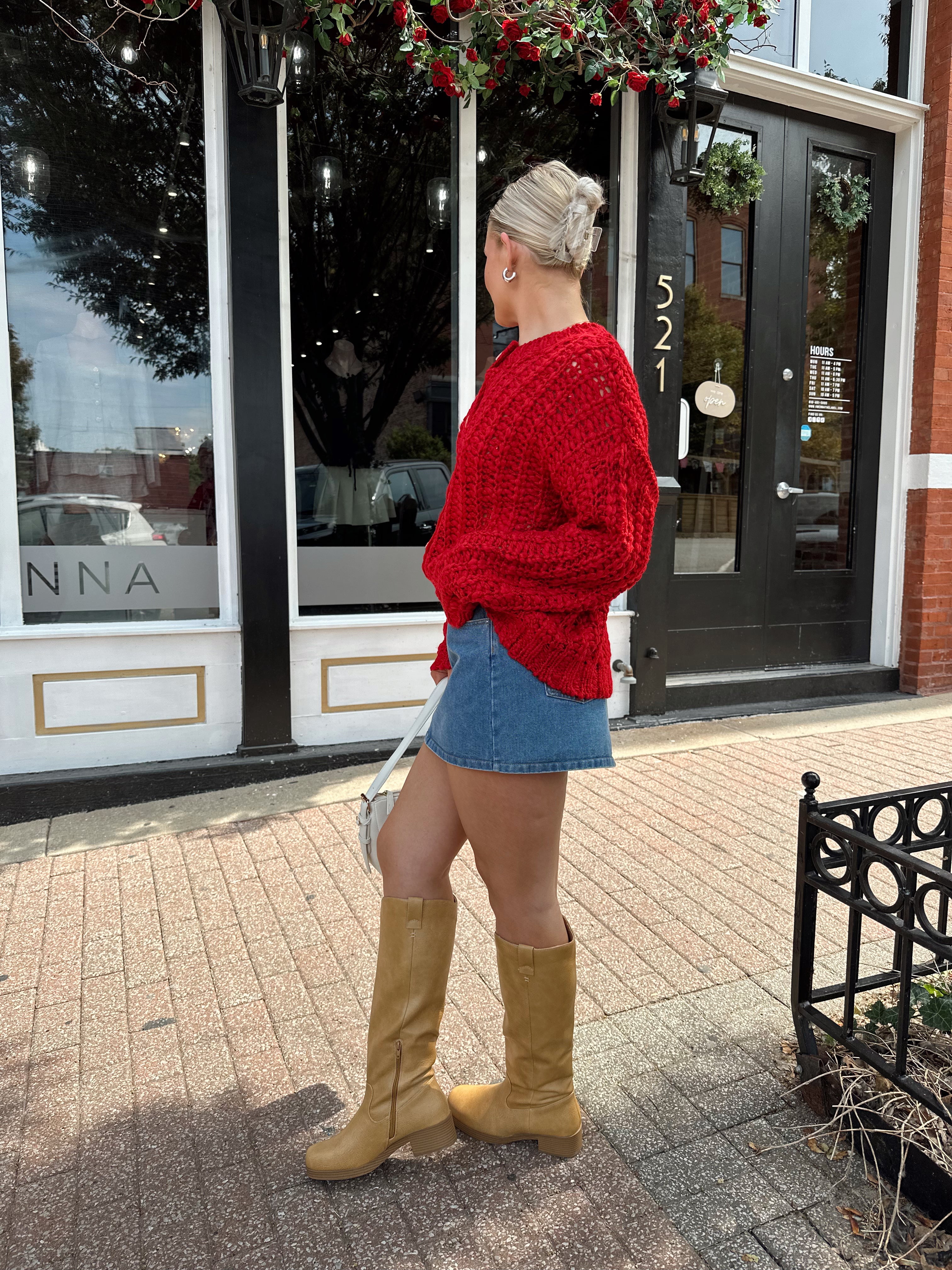 Red chunky knit cardigan with tortoise shell buttons. 