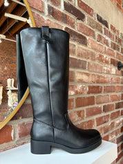 Black knee-high boots with block heel.