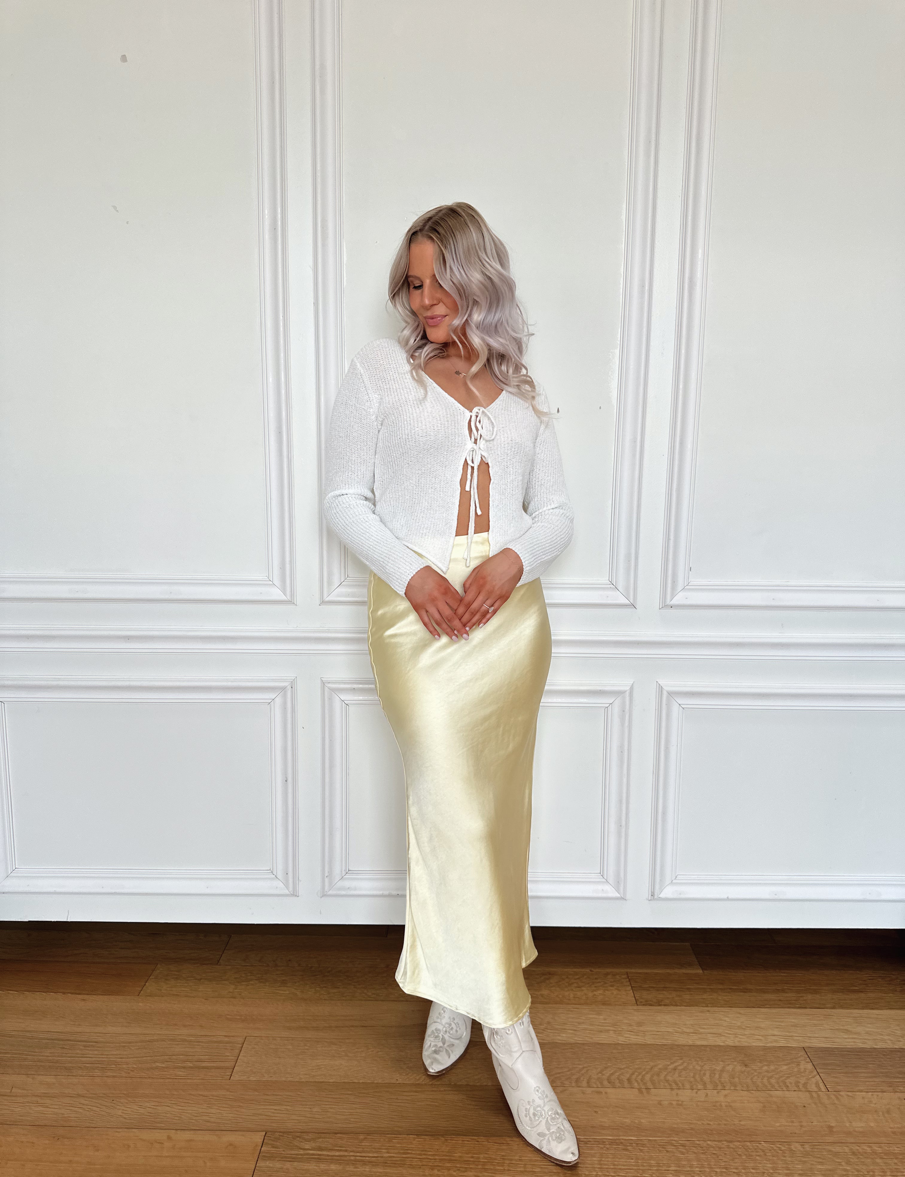 White knit long sleeve tie top. Perfect for spring and summer. 