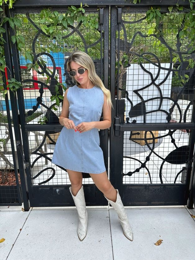 Della sleeveless light wash denim mini dress with seams