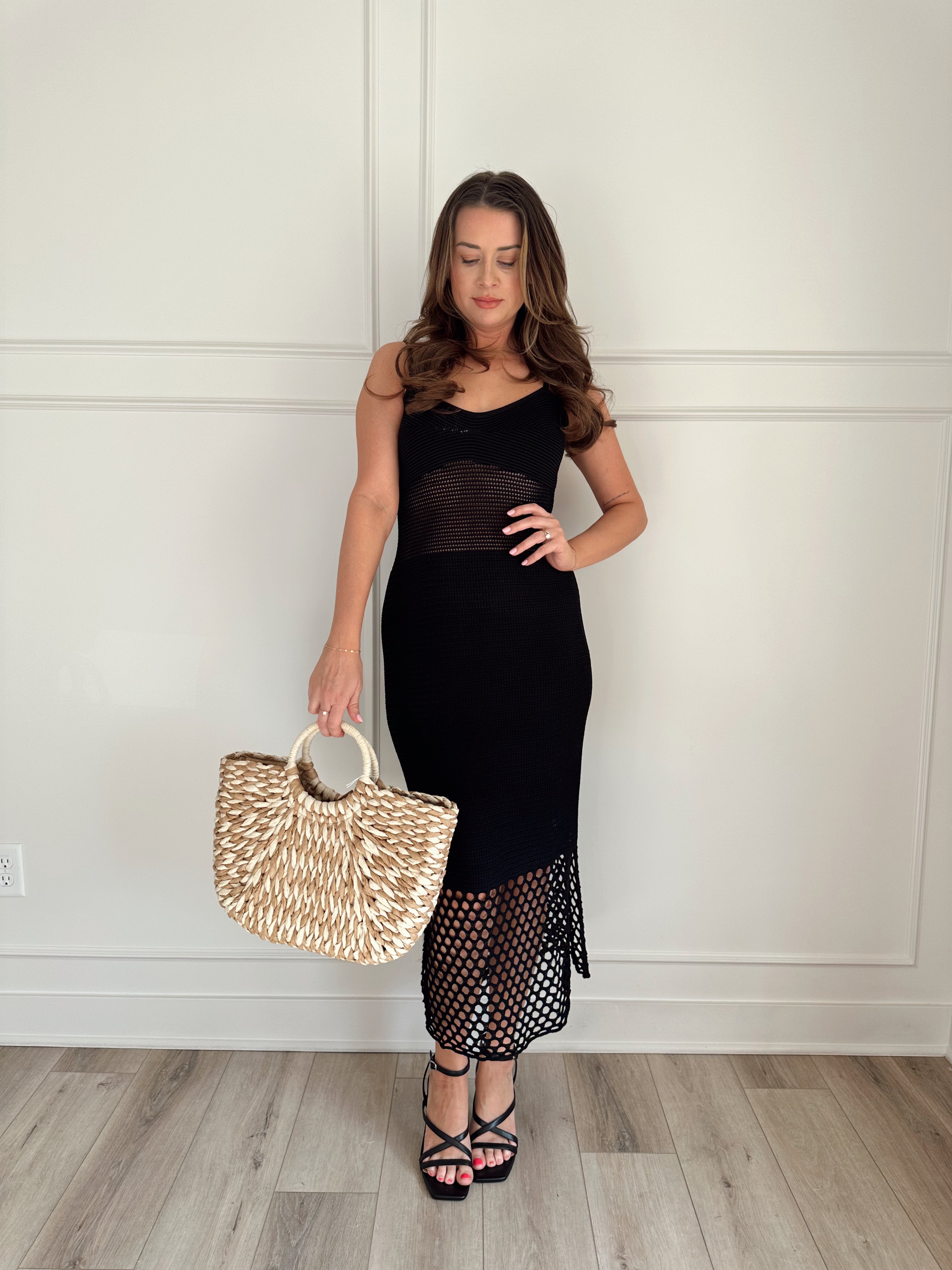 Black knit midi dress with slits up the side. Also comes in cream and blue. 
