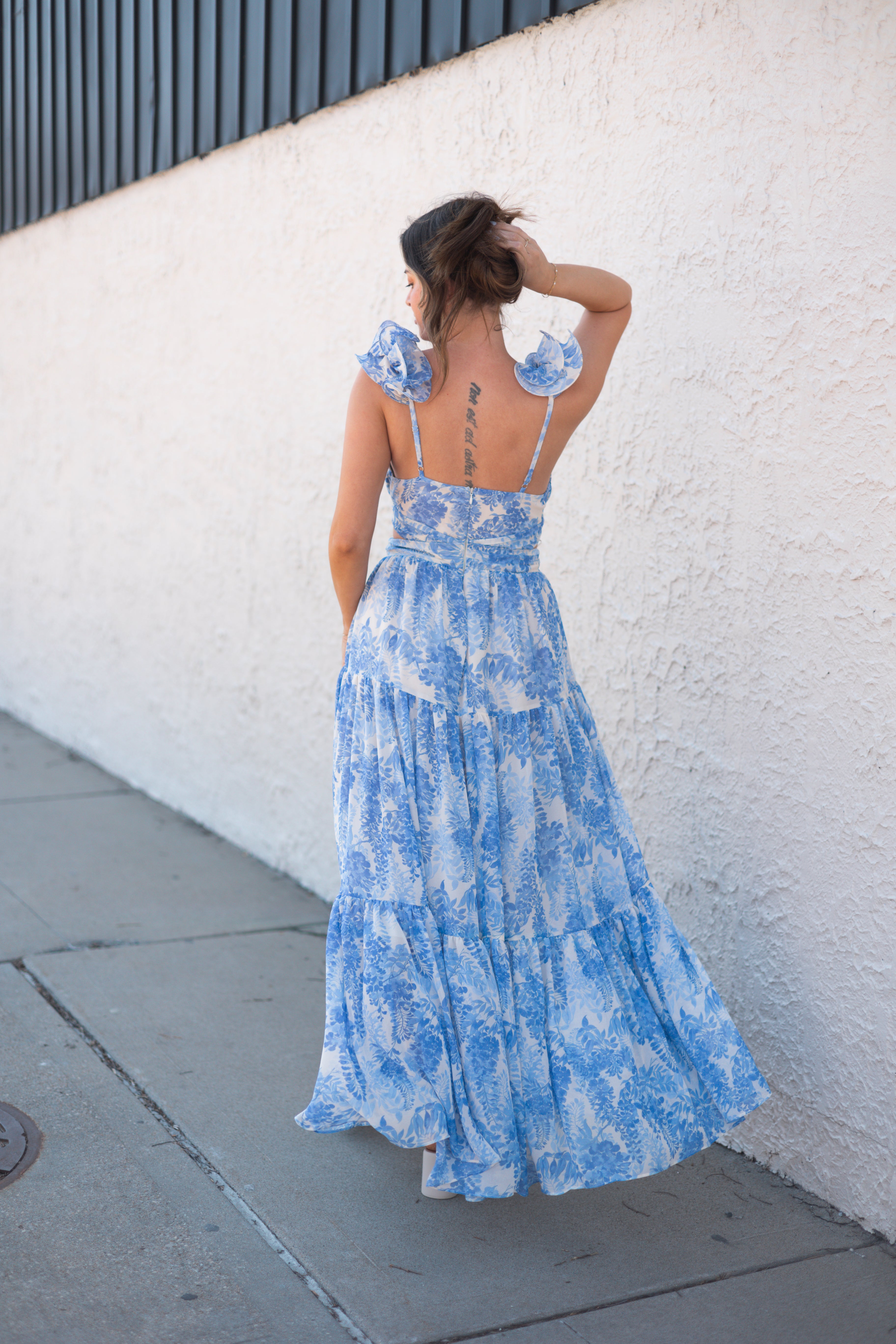 Back of Kenzie Blue Floral Maxi Dress with Cutouts and Slit.