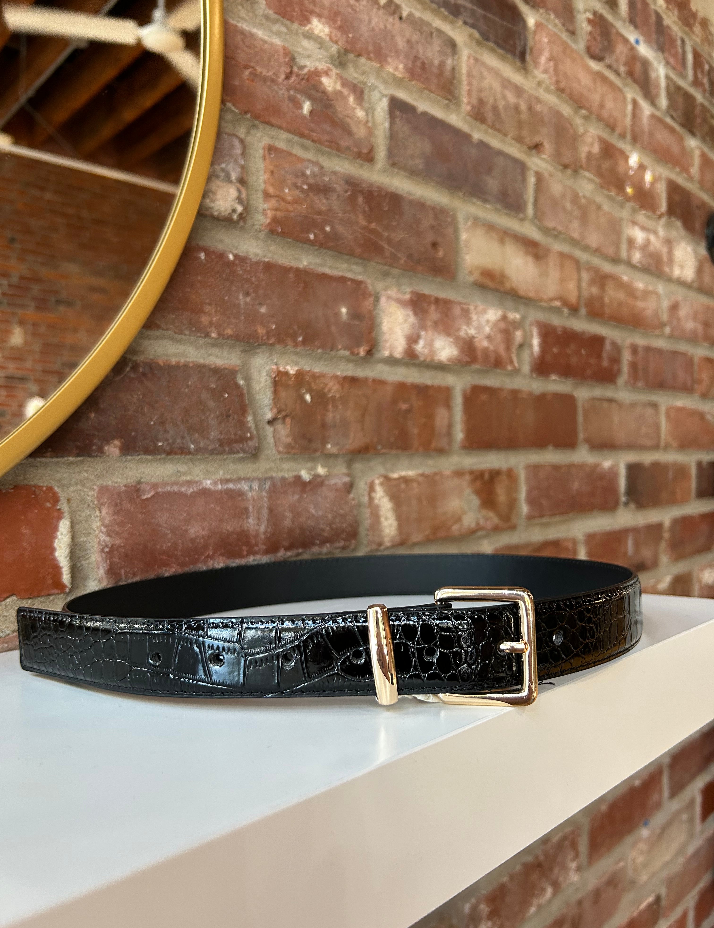 Black croc belt with gold buckle hardware.