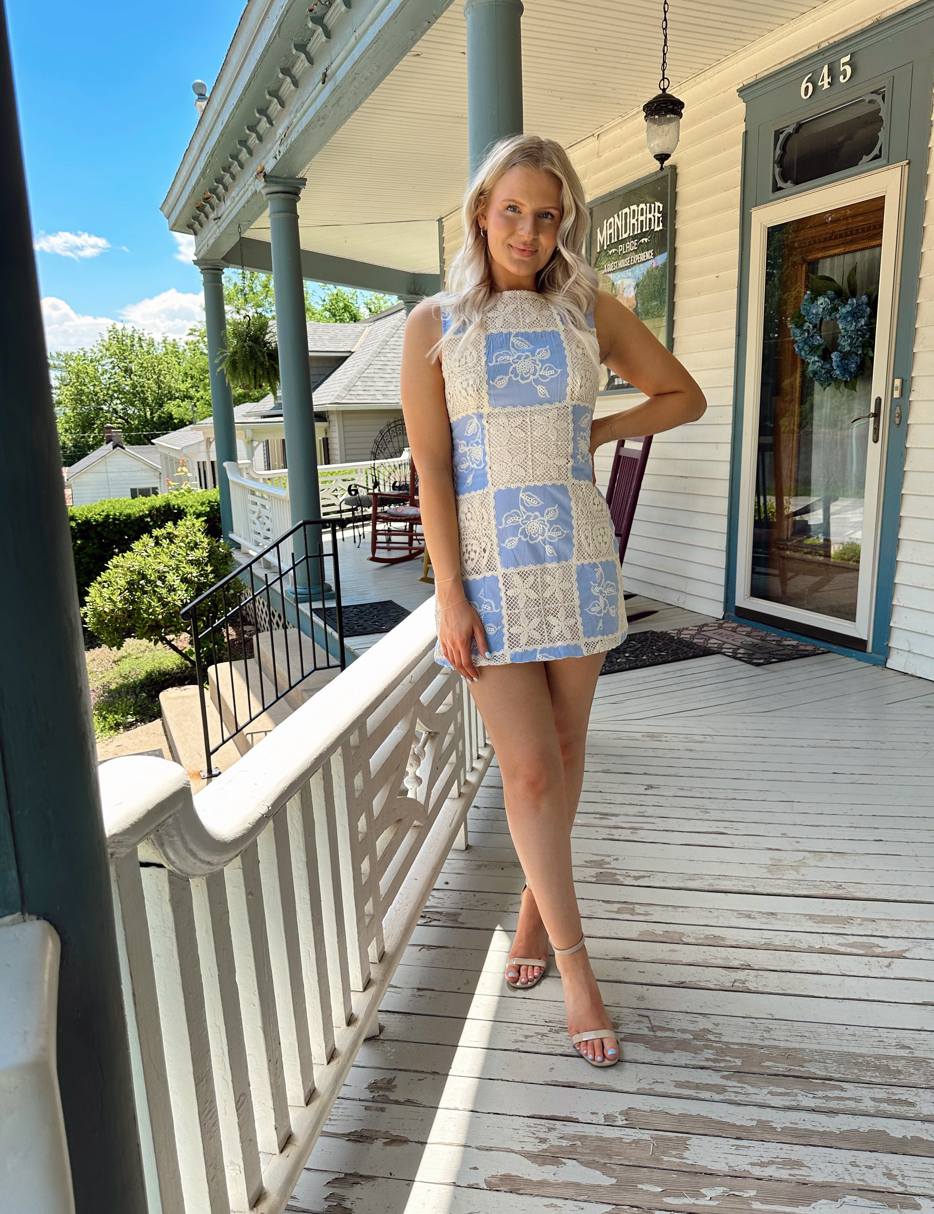 Blue and tan crochet patchwork mini dress. A-line fit. Perfect for summer