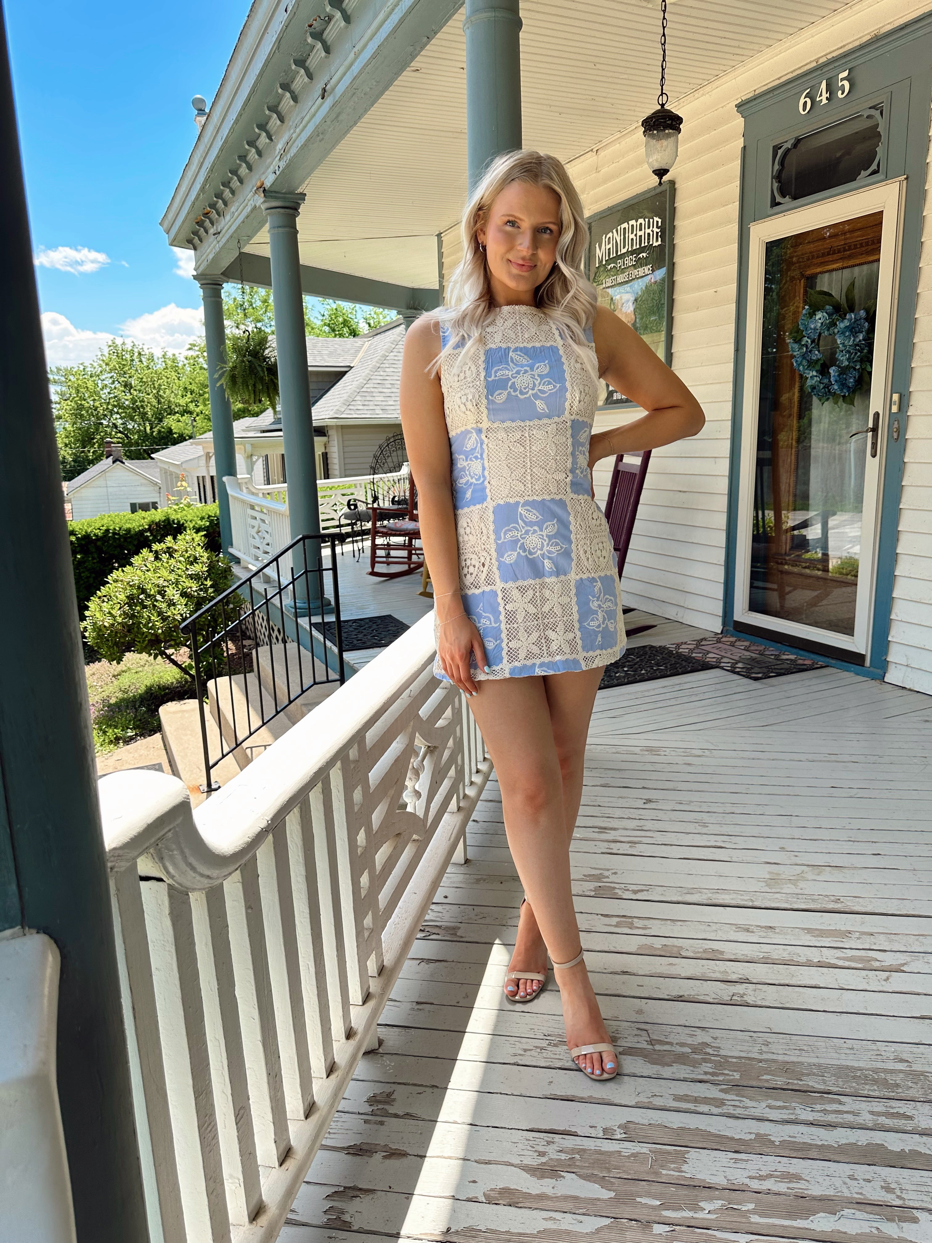 Blue and tan crochet patchwork mini dress. A-line fit. Perfect for summer