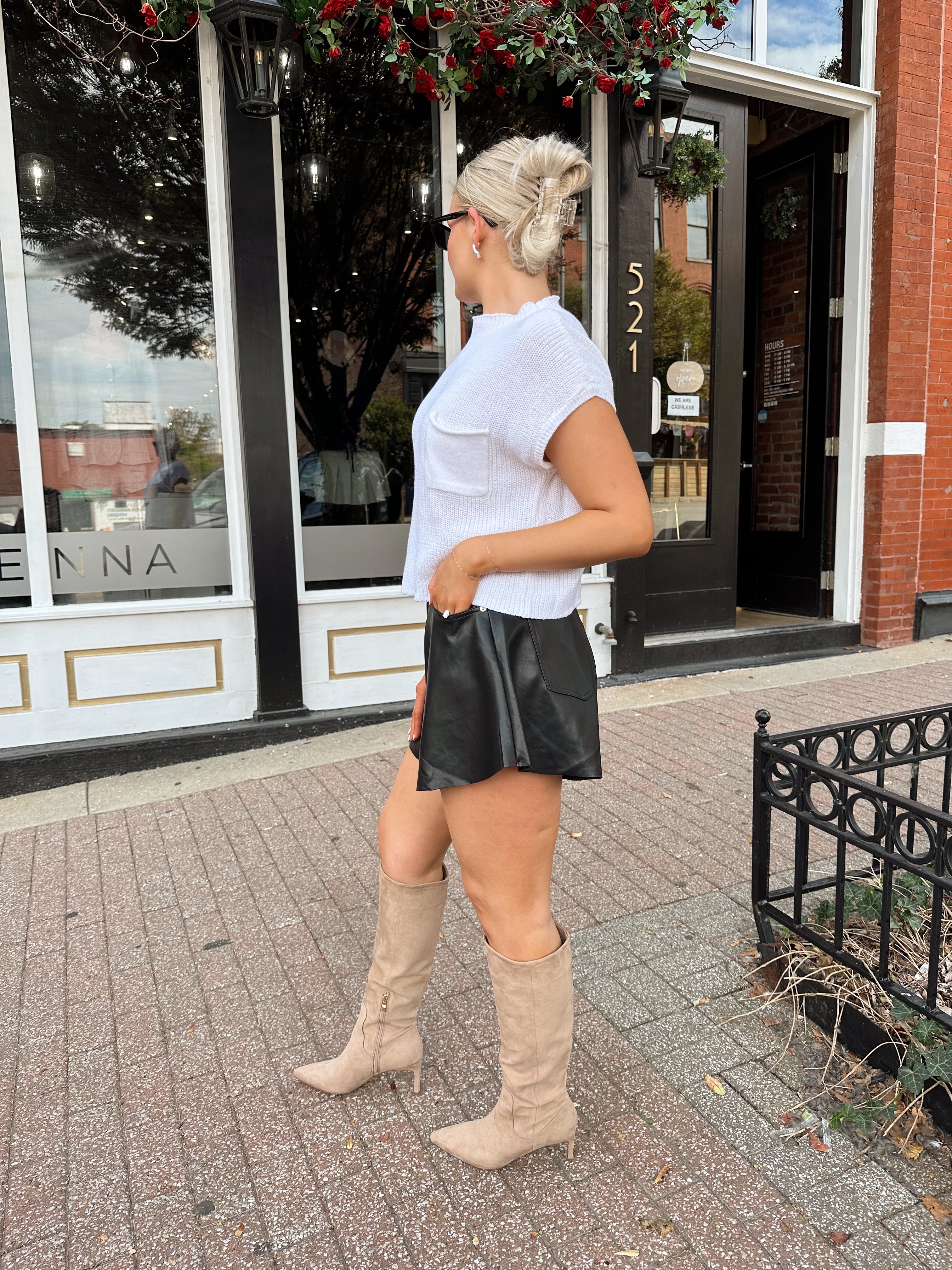 White knit cropped short sleeve sweater with front pocket detail