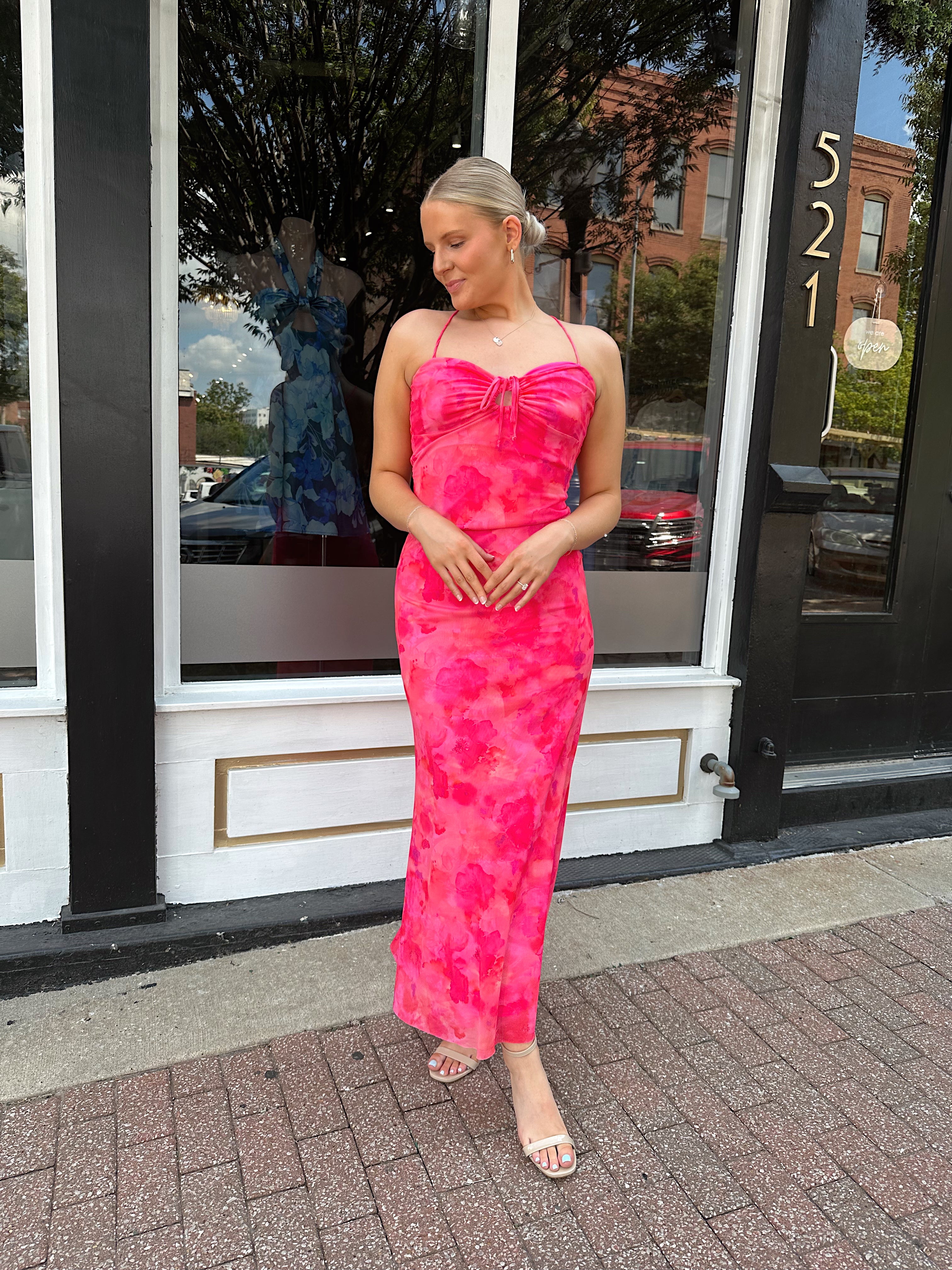 Hot pink floral mesh maxi dress with criss-cross back.