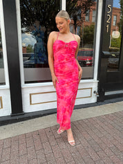 Hot pink floral mesh maxi dress with criss-cross back.