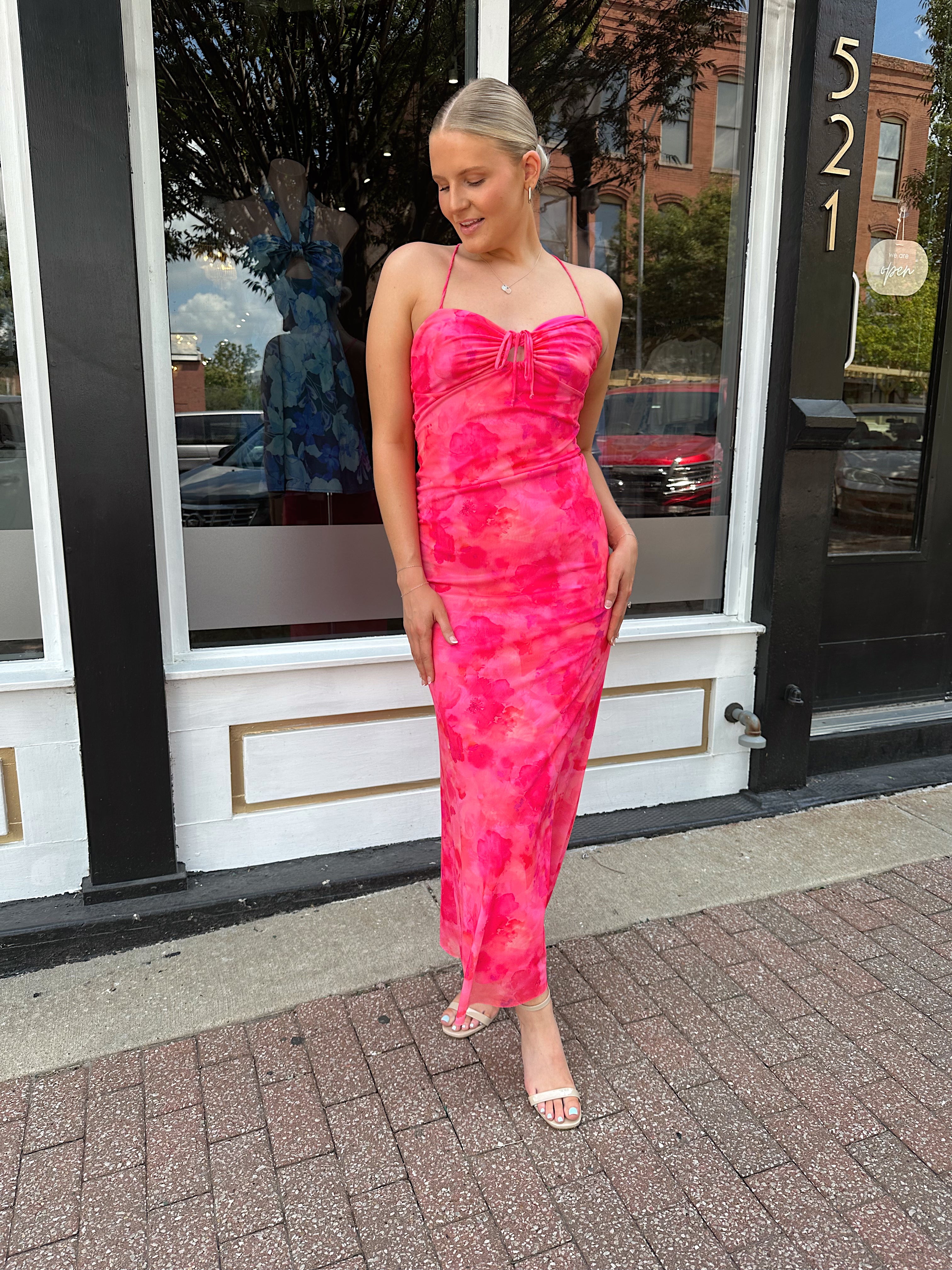 Hot pink floral mesh maxi dress with criss-cross back.