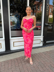 Hot pink floral mesh maxi dress with criss-cross back.