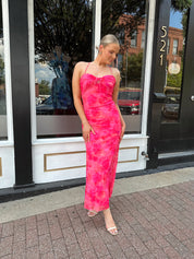 Hot pink floral mesh maxi dress with criss-cross back.