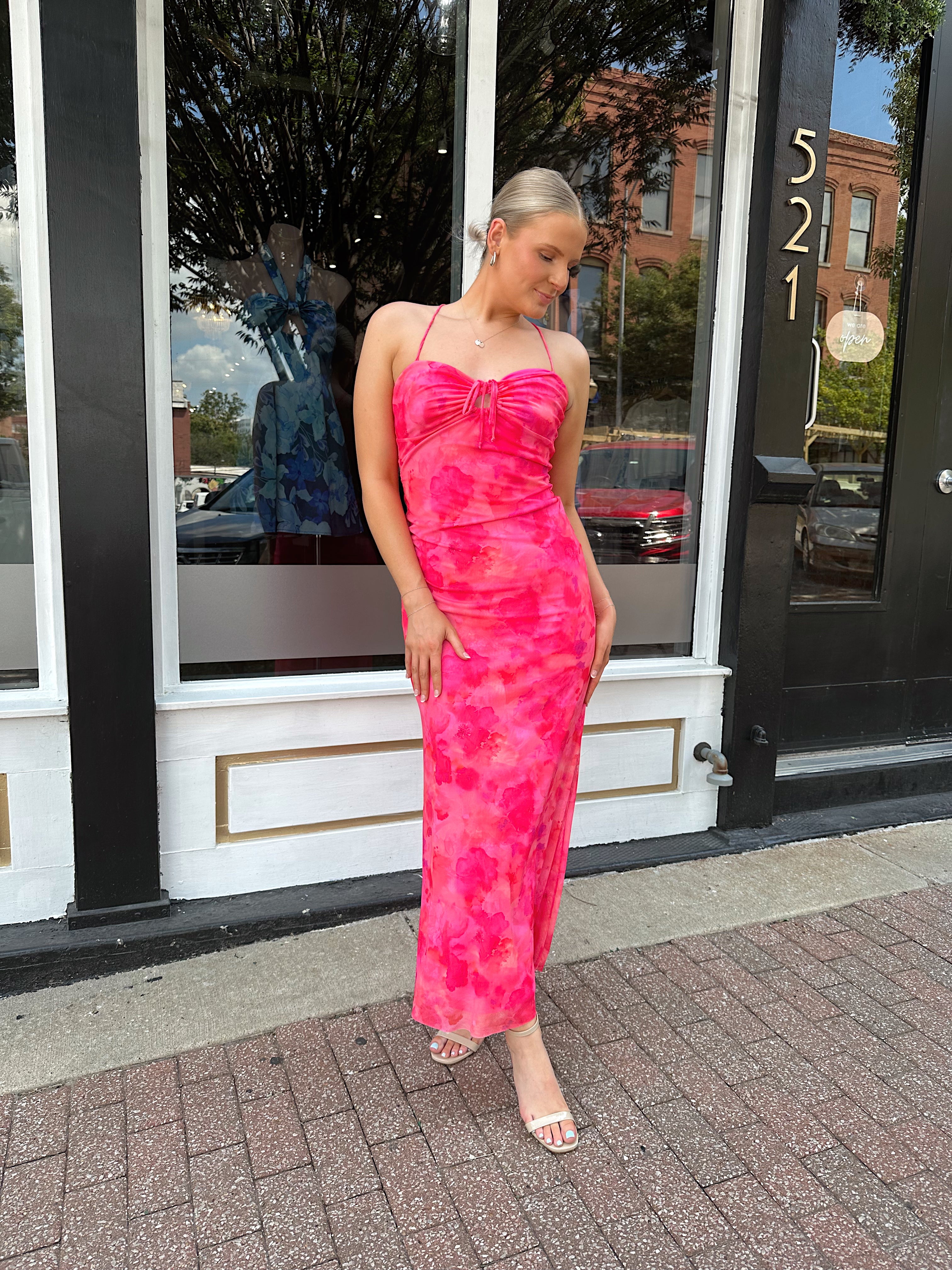 Hot pink floral mesh maxi dress with criss-cross back.
