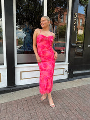 Hot pink floral mesh maxi dress with criss-cross back.