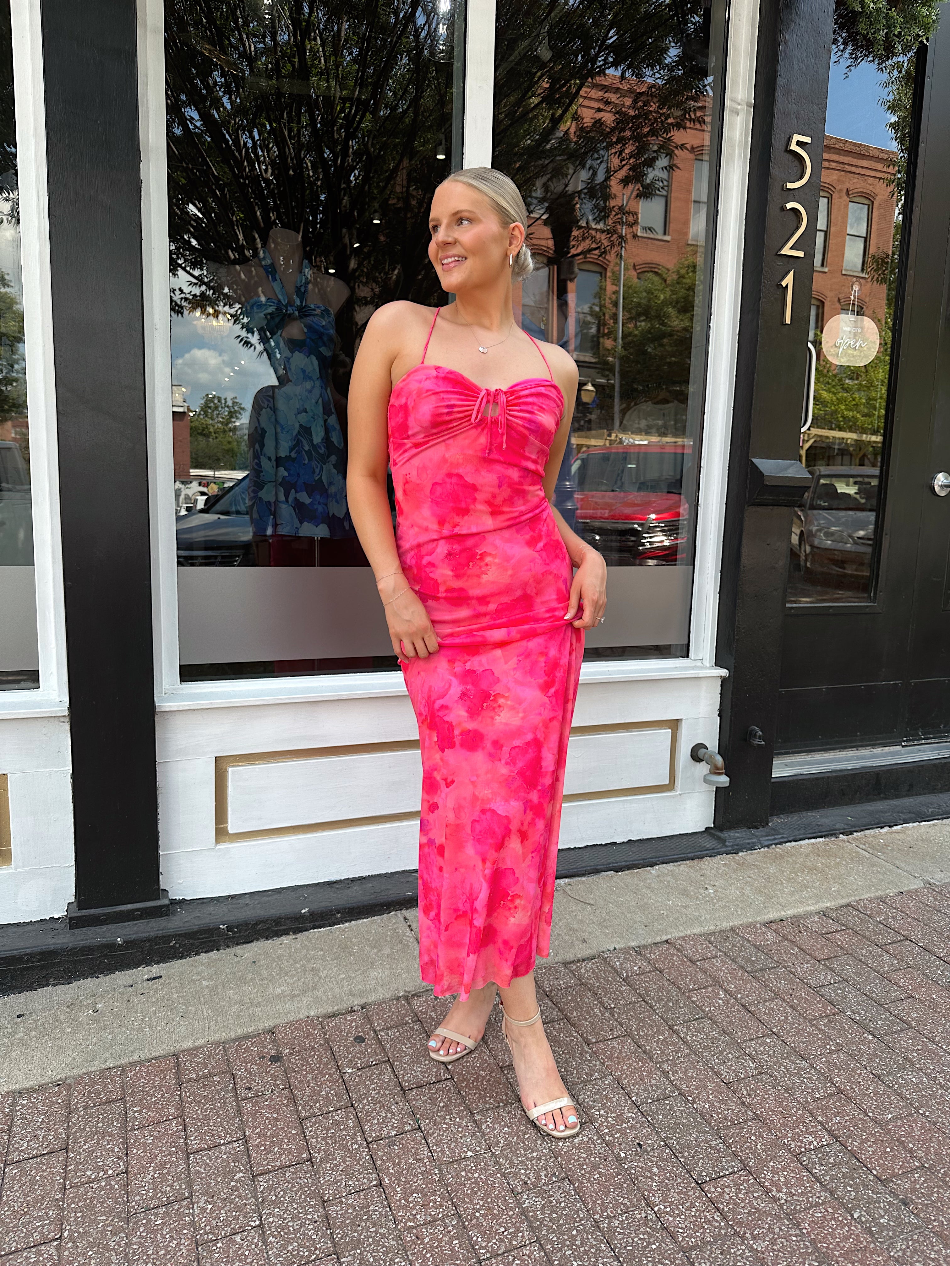 Hot pink floral mesh maxi dress with criss-cross back.