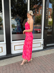 Hot pink floral mesh maxi dress with criss-cross back.