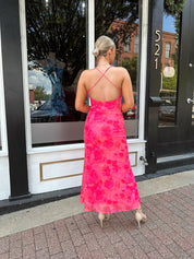 Hot pink floral mesh maxi dress with criss-cross back.