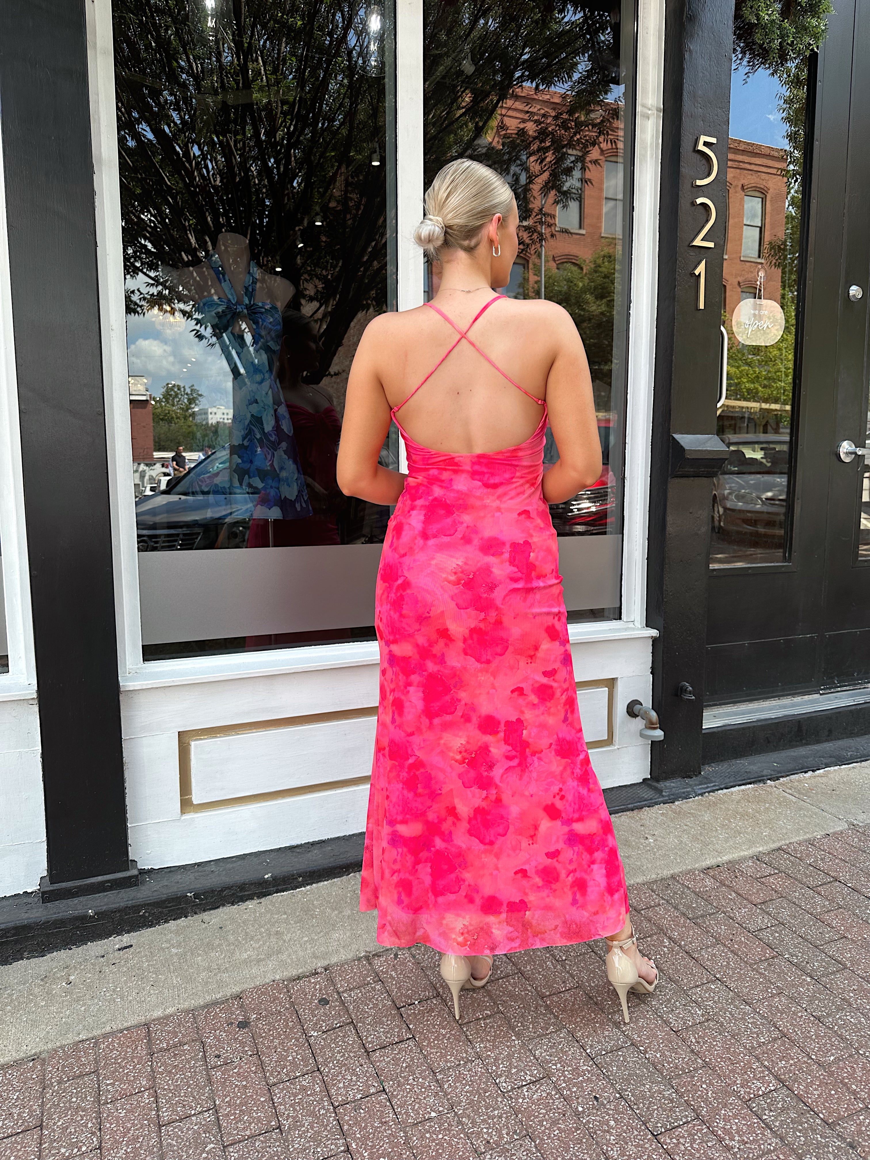 Hot pink floral mesh maxi dress with criss-cross back.
