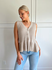 Taupe knit sweater vest top with button detailing.