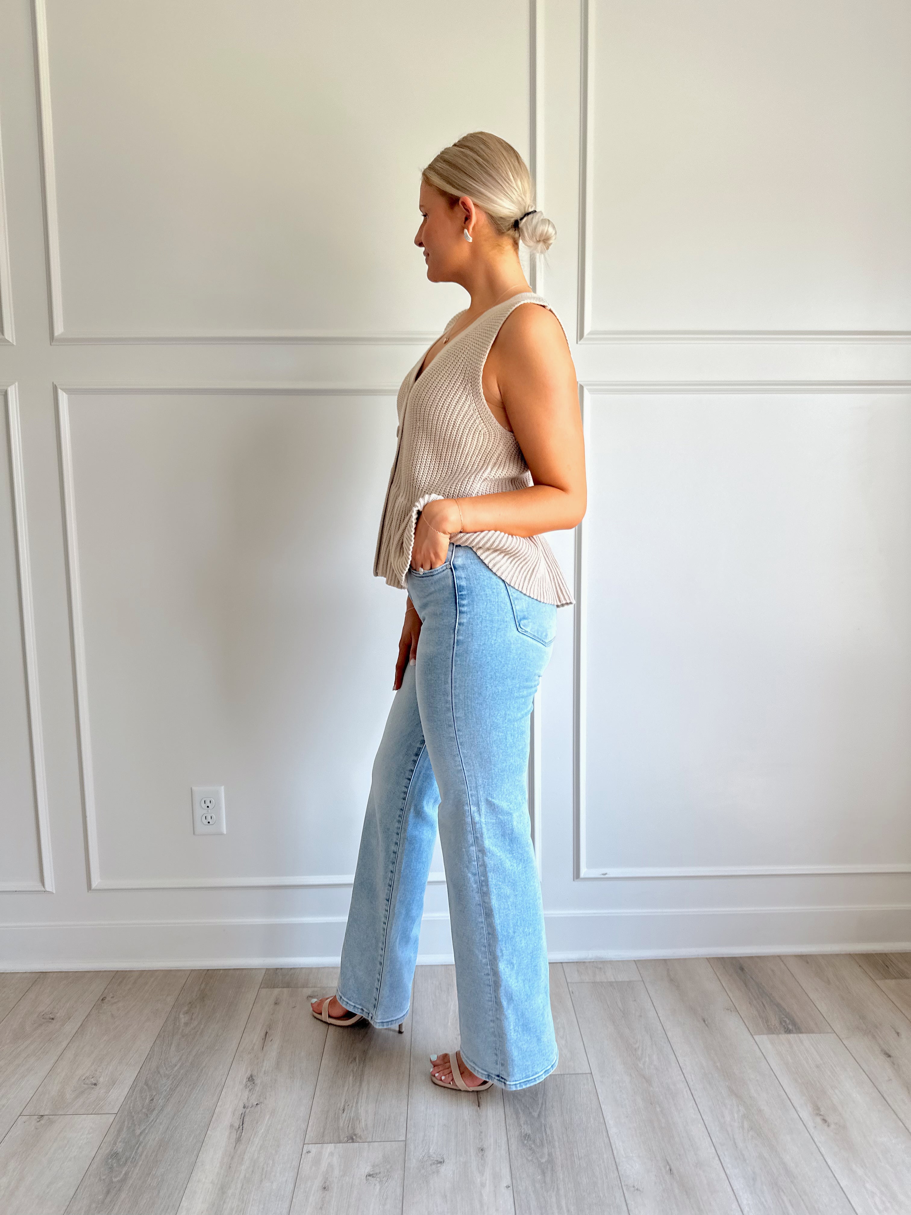 Taupe knit sweater vest top with button detailing.