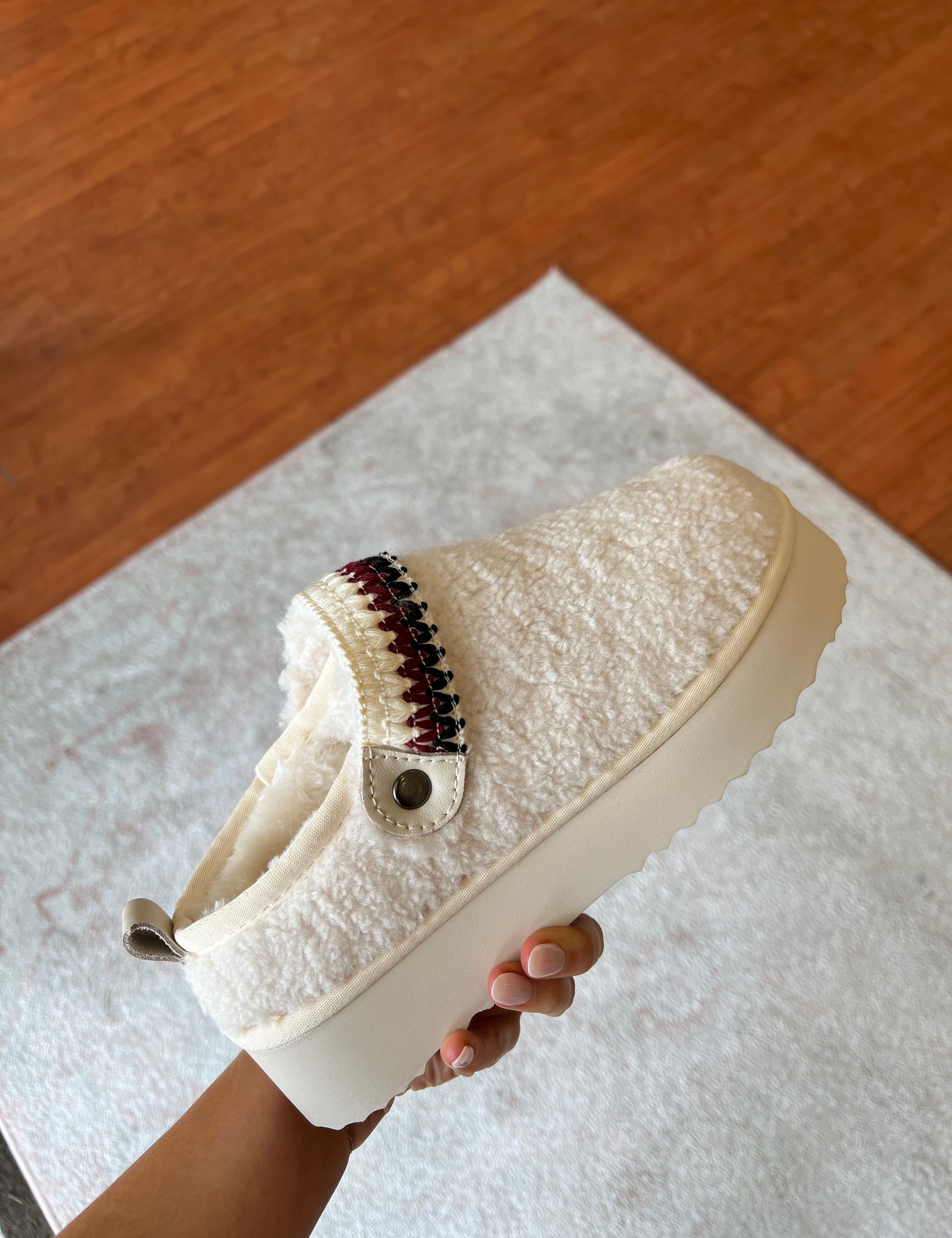Ivory Slip On Sherpa Clogs.