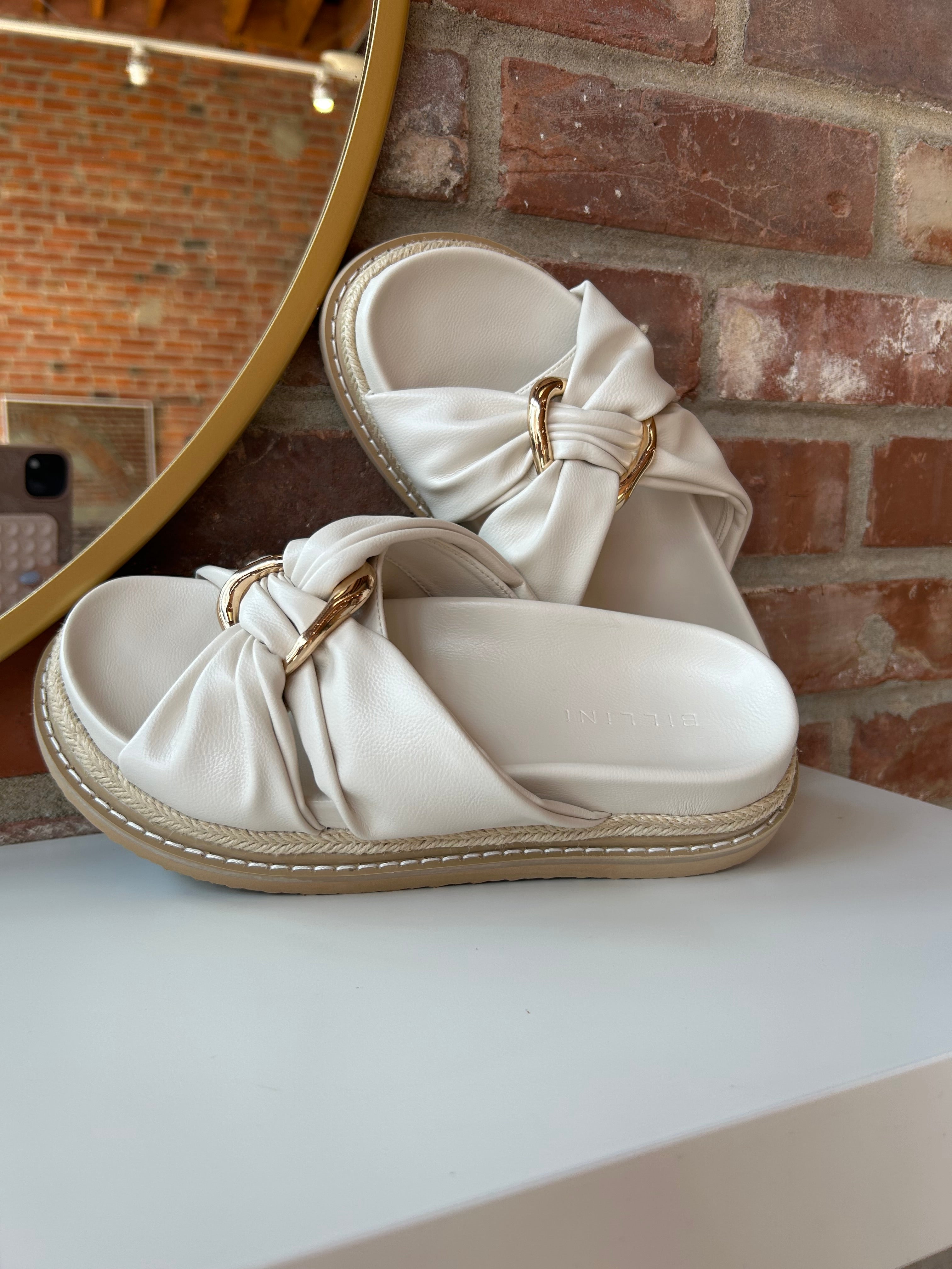 Billini Cove Gold Embellished Platform Sandal with a knotted upper, gold accents, and a woven platform sole for chic style.