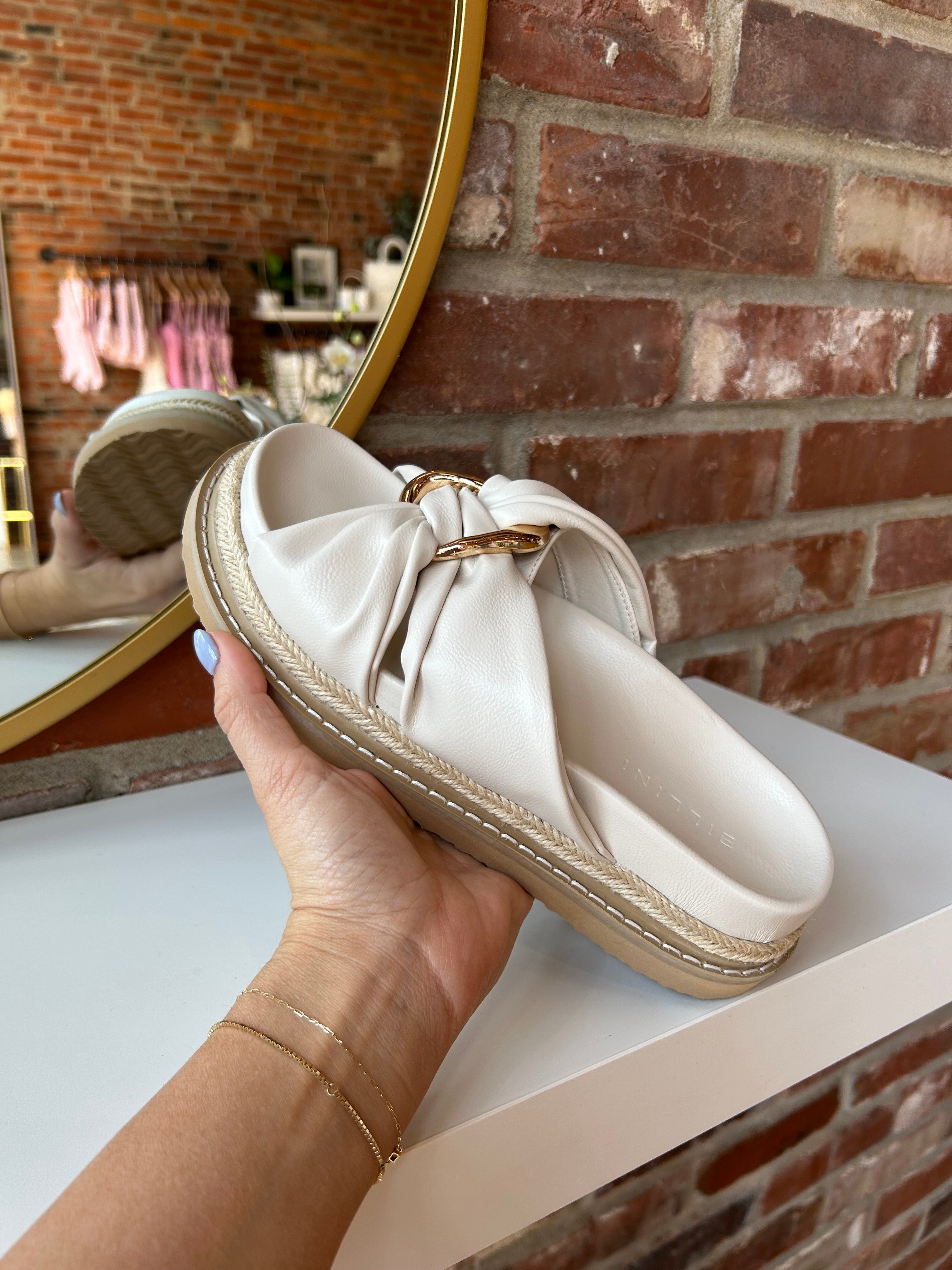 Billini Cove Gold Embellished Platform Sandal with a knotted upper, gold accents, and a woven platform sole for chic style.