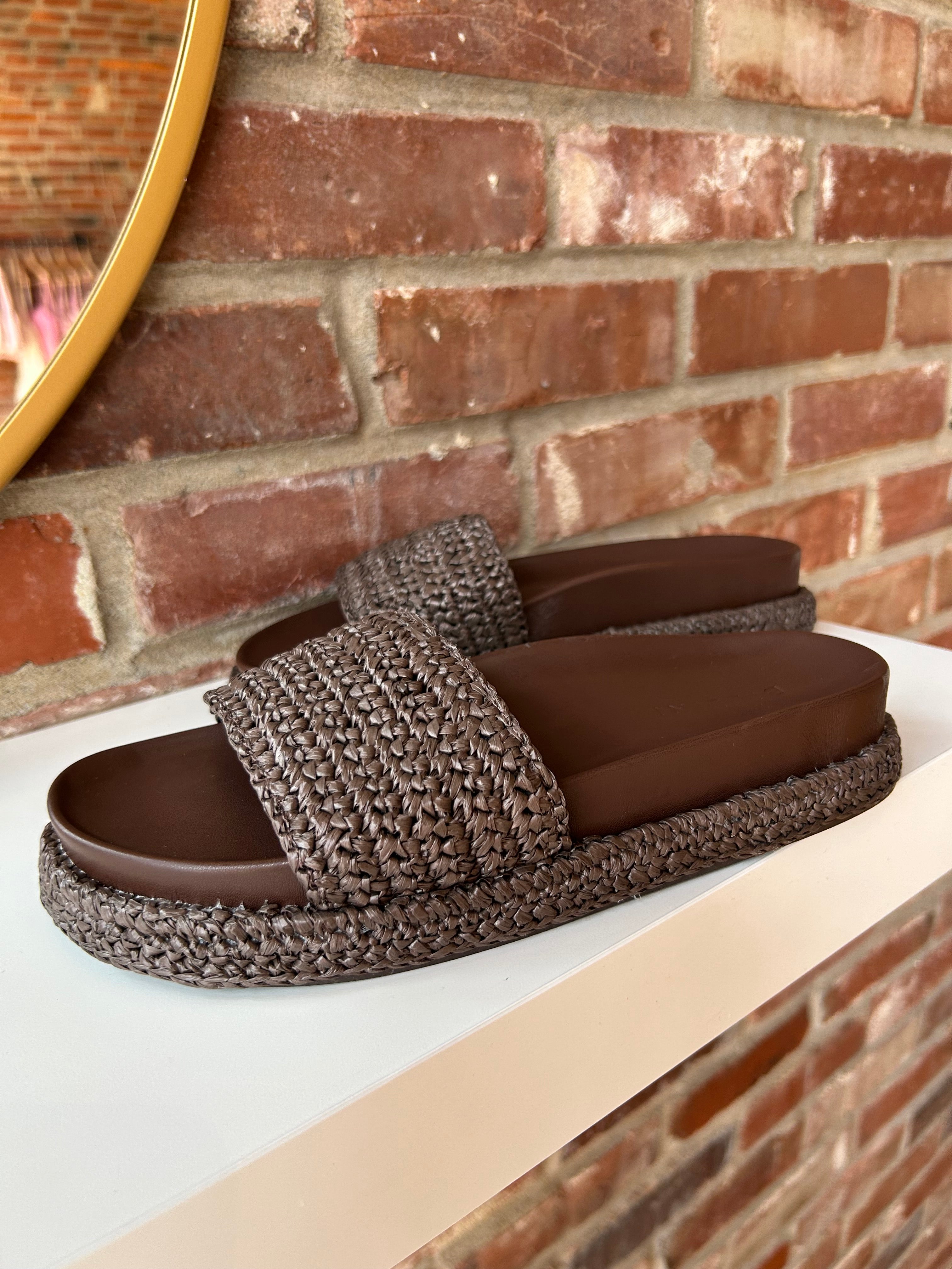 Billini Annie Brown Woven Sandal with a braided strap, cushioned sole, and slip-on design for a chic and comfortable look.