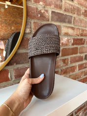 Billini Annie Brown Woven Sandal with a braided strap, cushioned sole, and slip-on design for a chic and comfortable look.