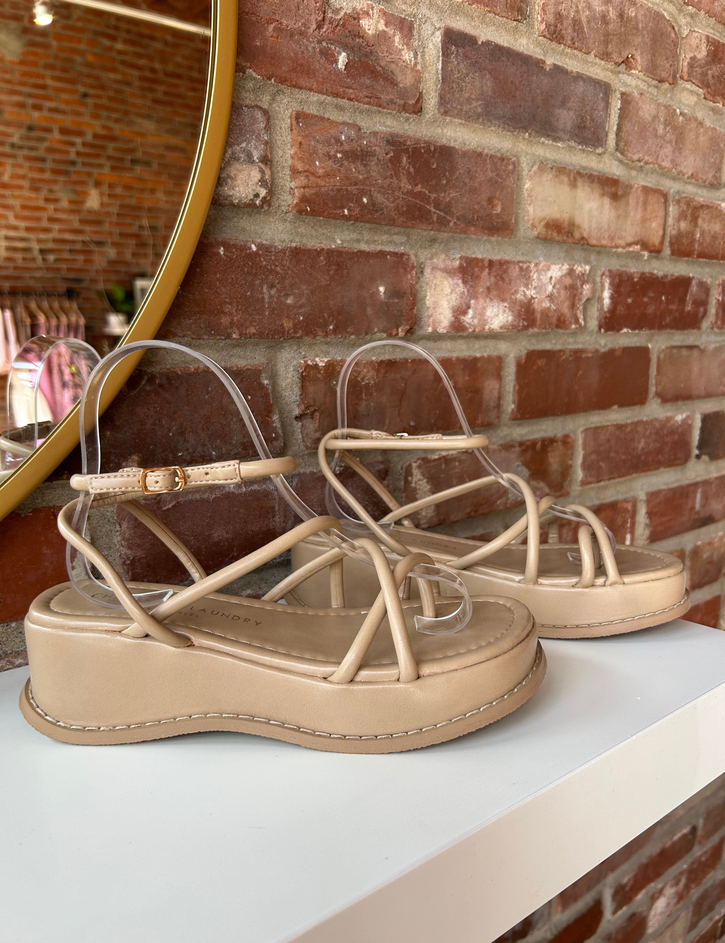 Taylor Strappy Platform Sandals with crisscross straps, an ankle buckle, and a cushioned platform sole for a trendy, comfortable fit