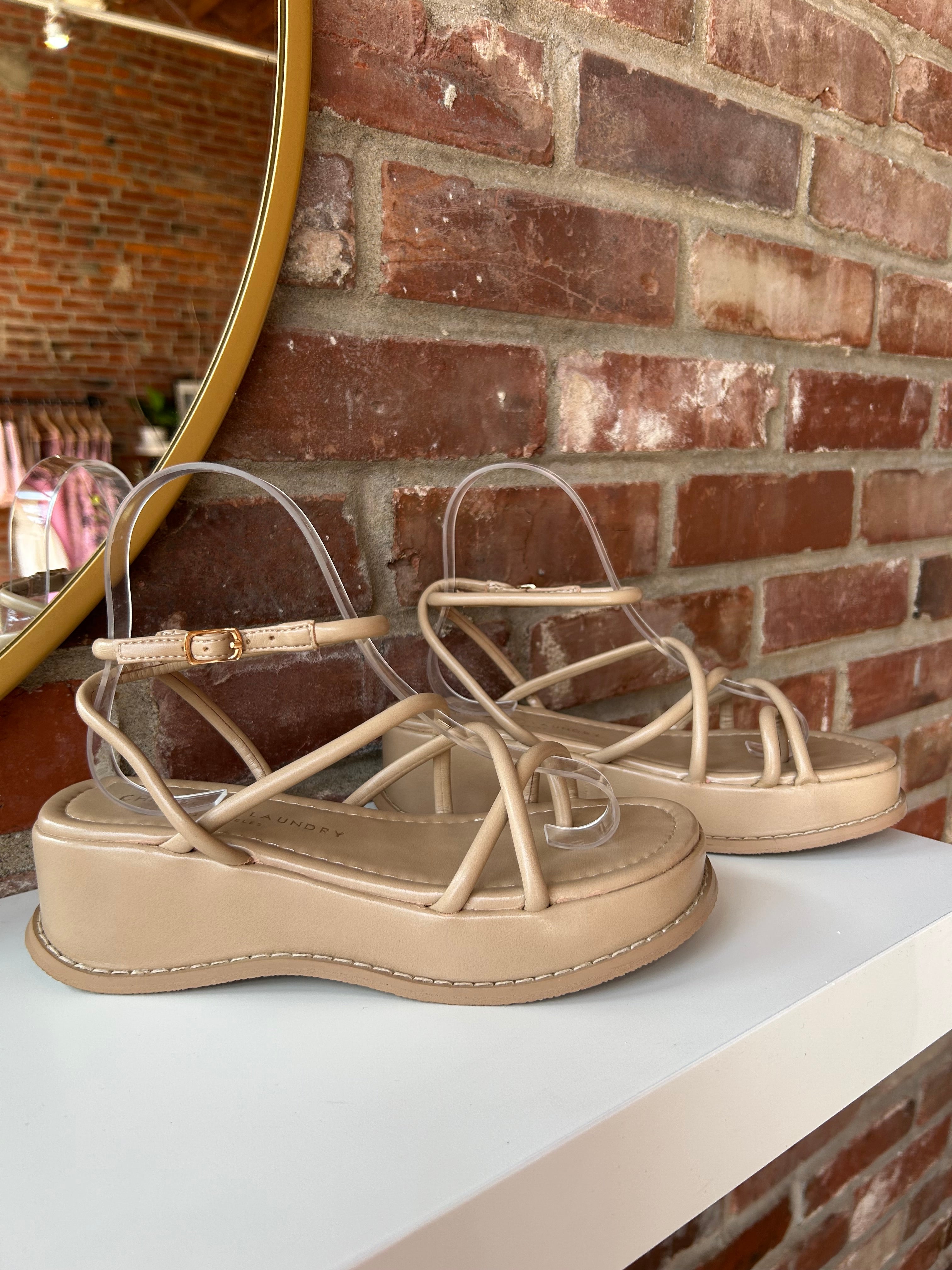 Taylor Strappy Platform Sandals with crisscross straps, an ankle buckle, and a cushioned platform sole for a trendy, comfortable fit