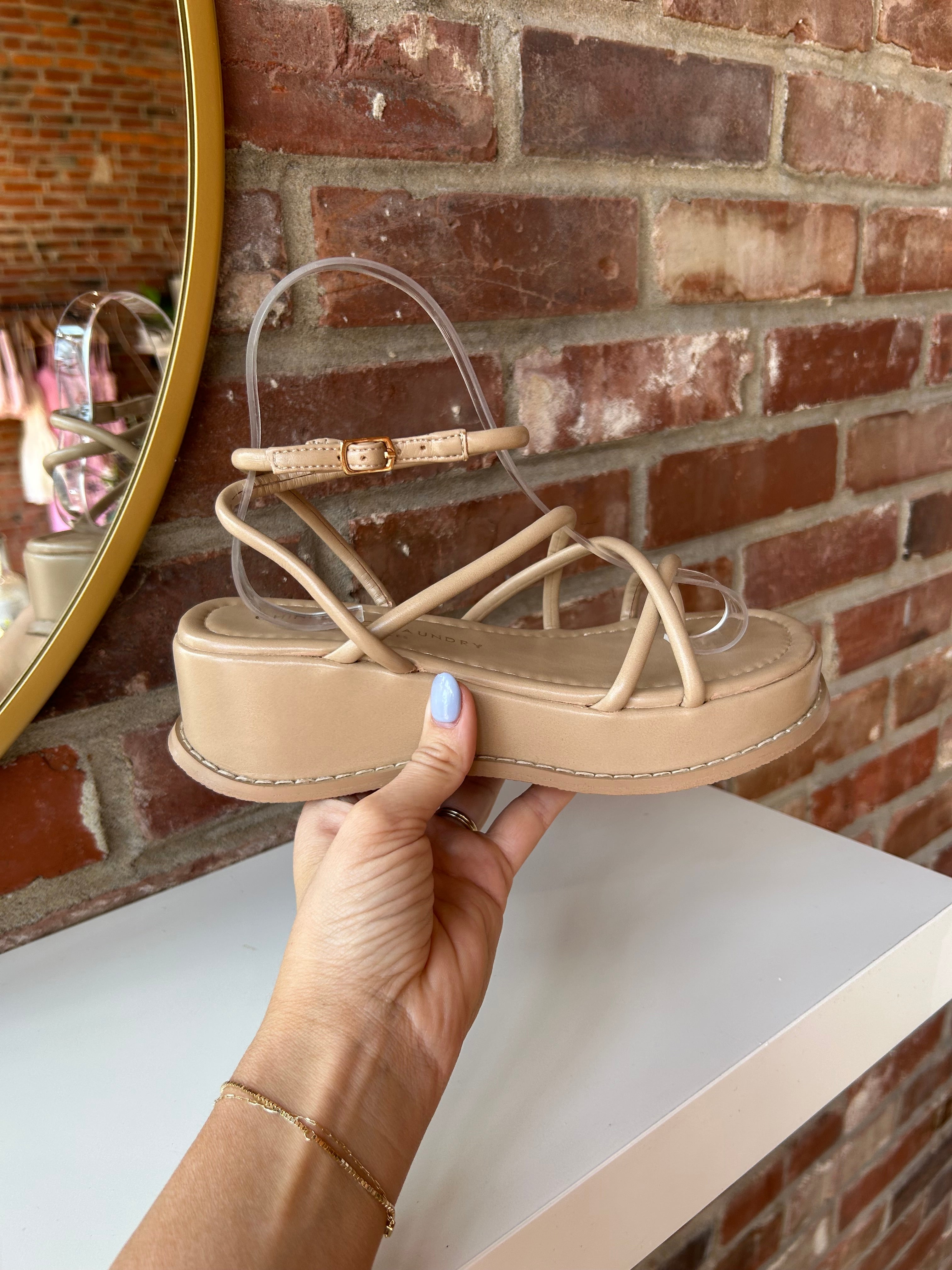 Taylor Strappy Platform Sandals with crisscross straps, an ankle buckle, and a cushioned platform sole for a trendy, comfortable fit