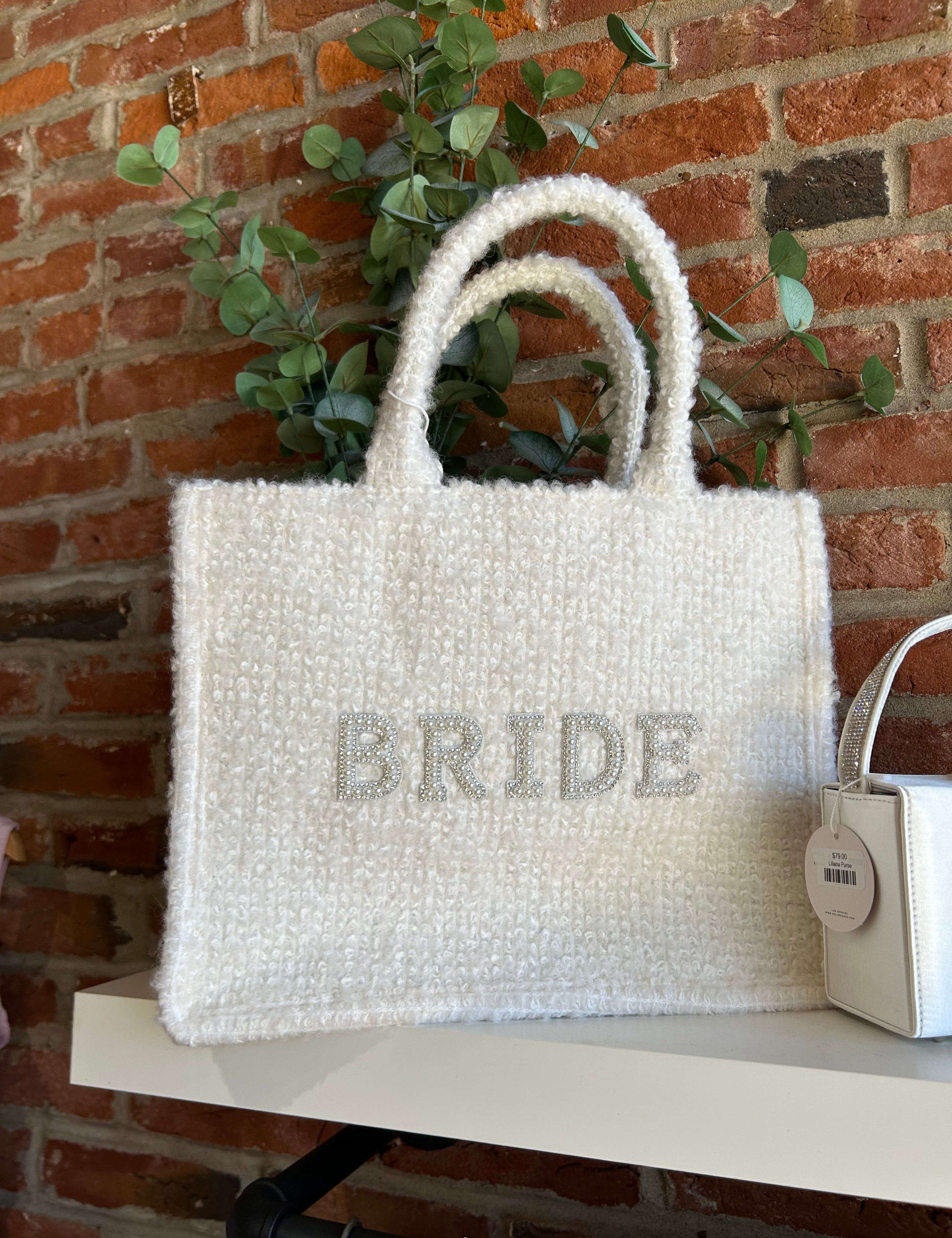 Bride Tweed Tote Bag with pearl-embellished lettering, soft textured fabric, and durable handles for a stylish bridal look.