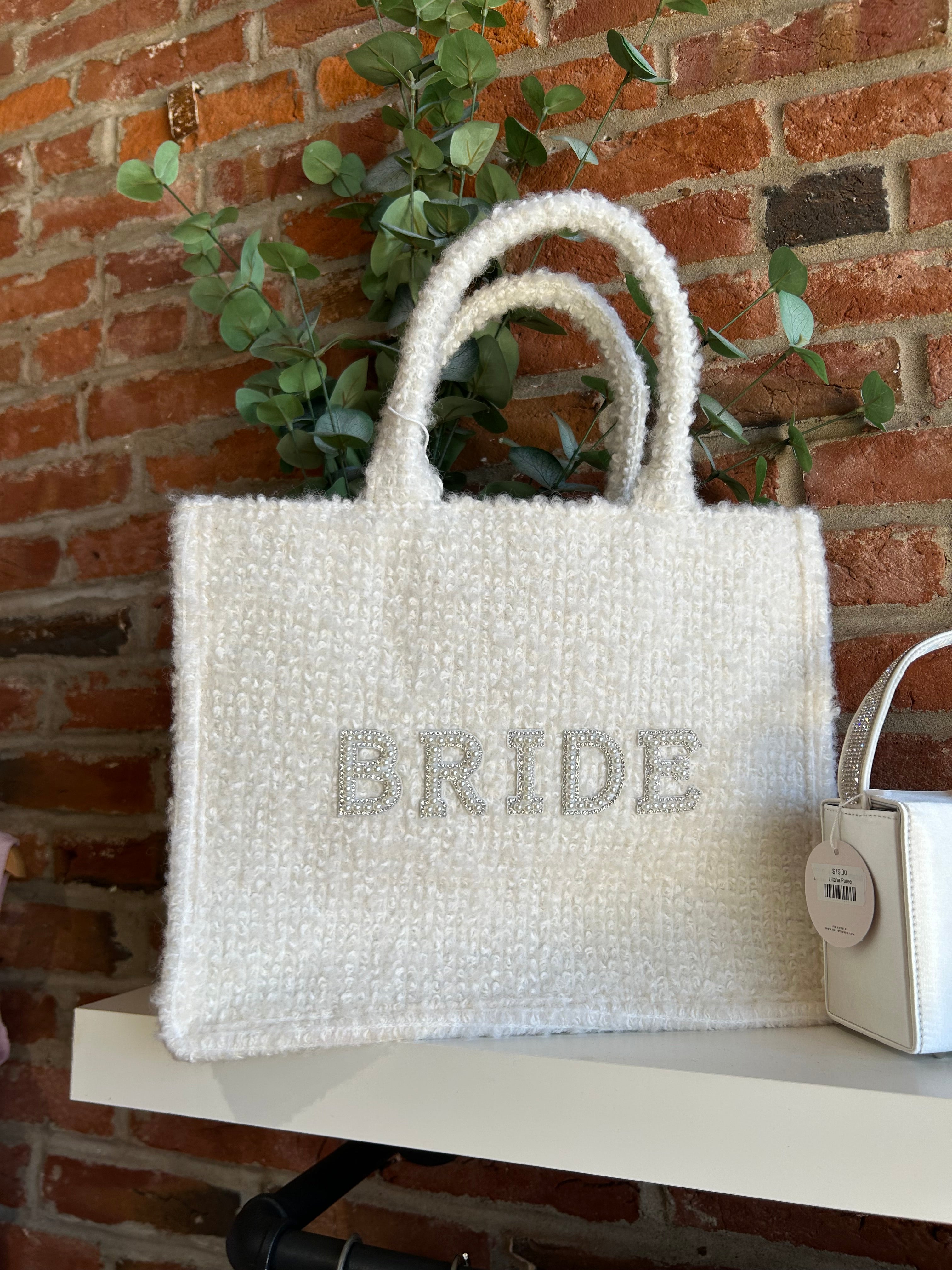 Bride Tweed Tote Bag with pearl-embellished lettering, soft textured fabric, and durable handles for a stylish bridal look.