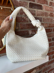 Zara Woven Handbag - Cream with a textured woven design, knotted handle, and zip closure for a stylish and versatile look.