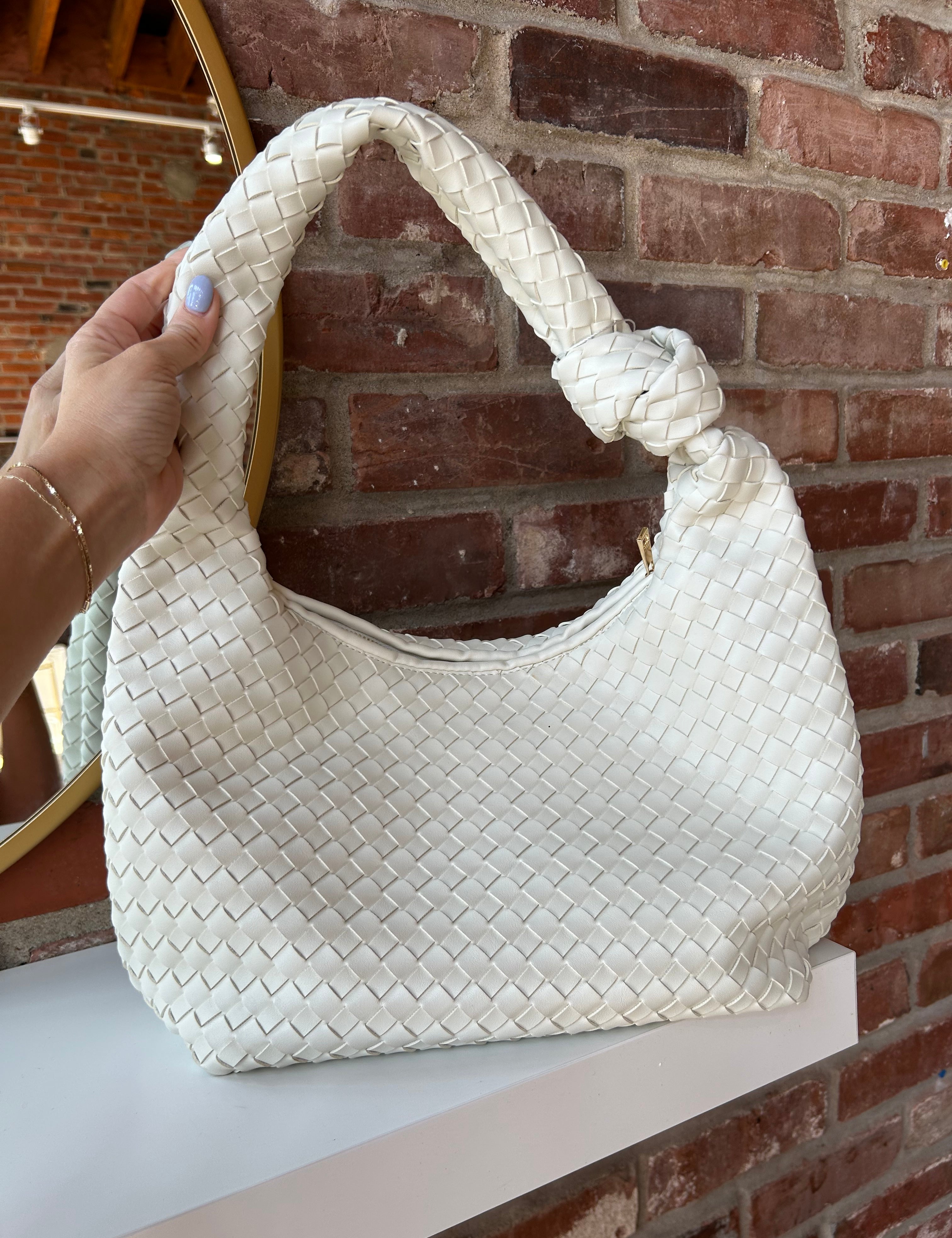 Zara Woven Handbag - Cream with a textured woven design, knotted handle, and zip closure for a stylish and versatile look.